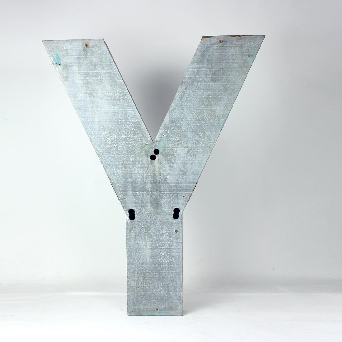 Amazing piece of vintage wall art. An industrial letter made of zinc sheet. Original sign used until recently in a factory in Czechoslovakia. Produced in 1950s. The letter is huge, 142cm high. It is definitely a statement whereever this piece