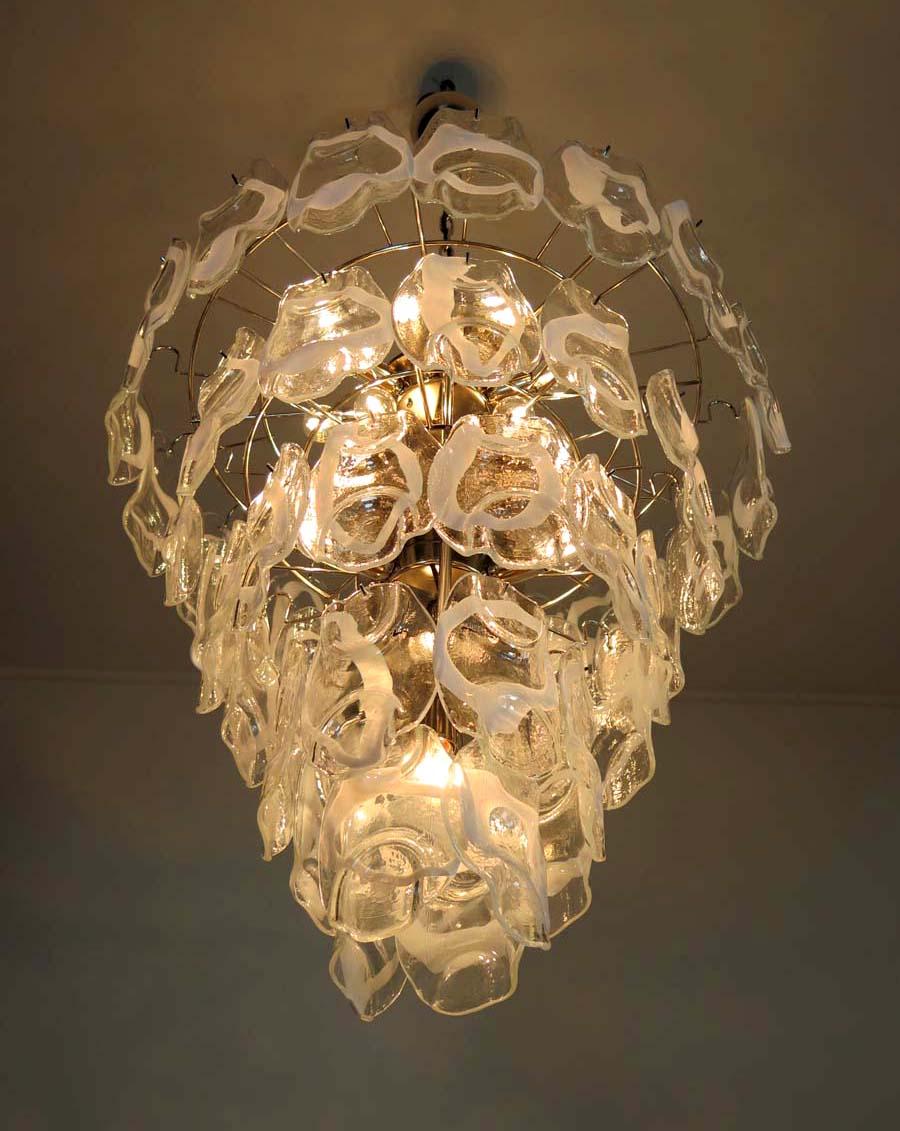 Huge Vintage Italian Murano chandelier in Vistosi style. The chandelier has 50 fantastic Murano white and transparent glasses (