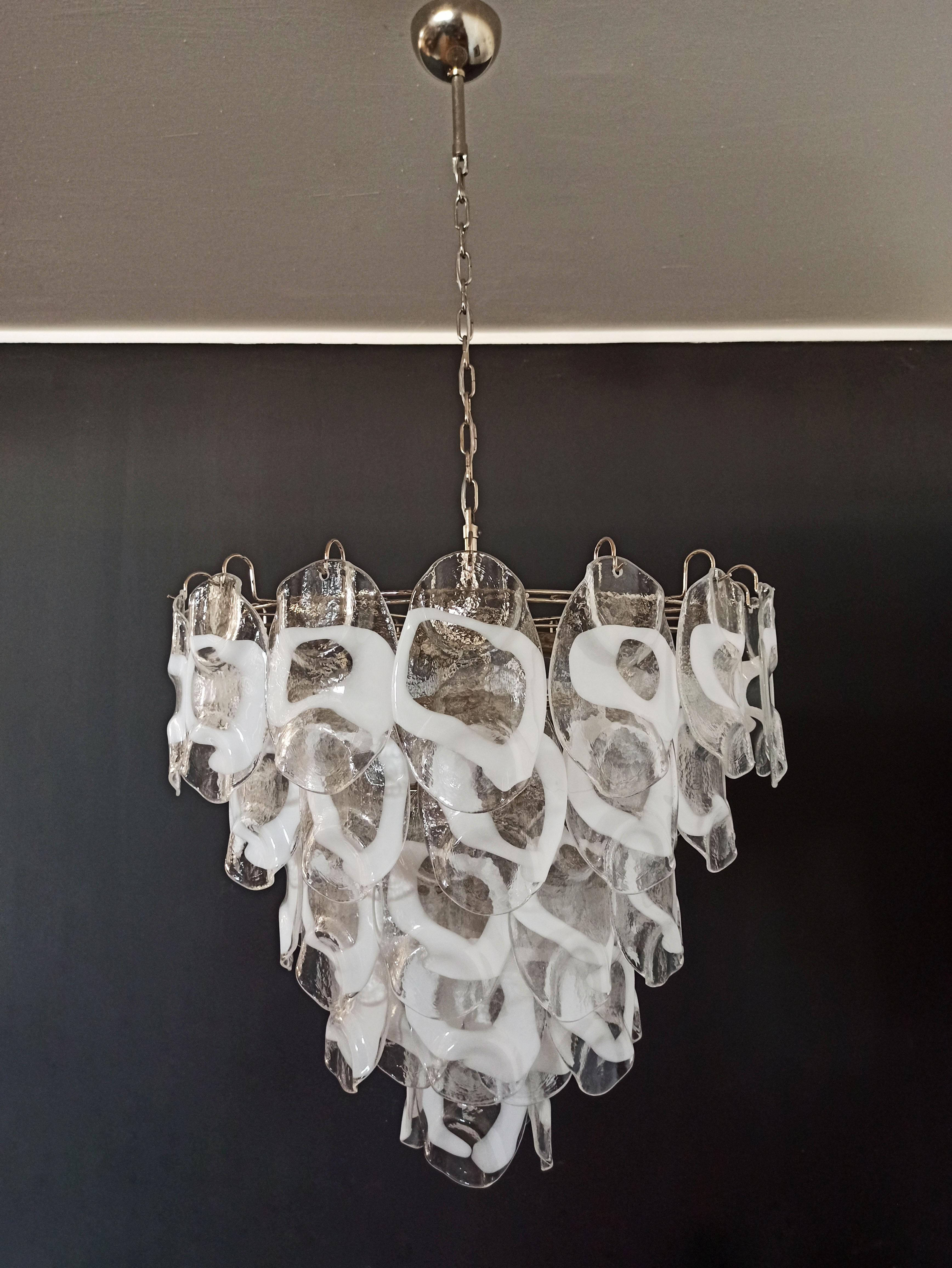 Huge Vintage Italian Murano chandelier in Vistosi style. The chandelier has 57 fantastic Murano white and transparent glasses (