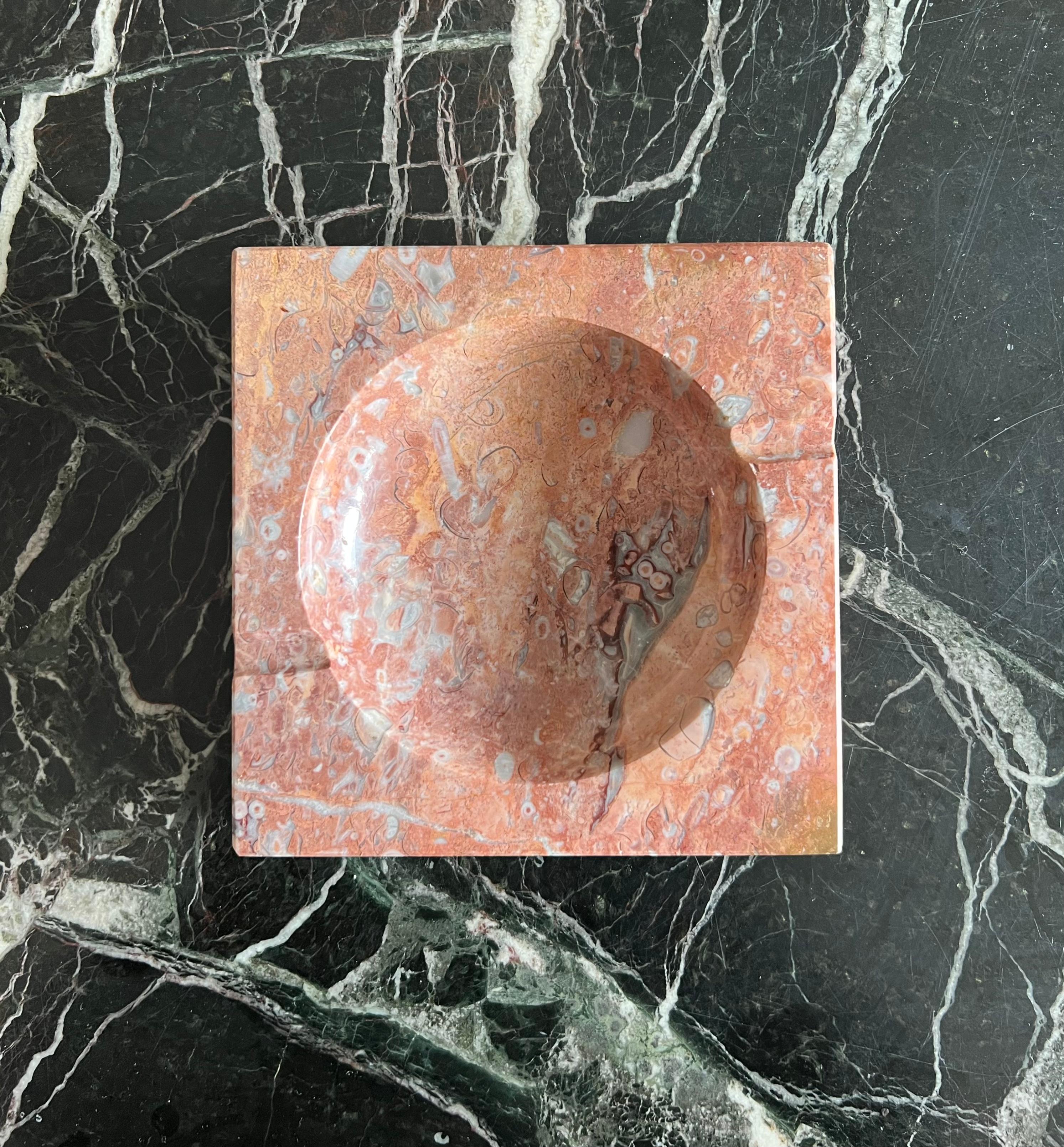 A large vintage marble ashtray, 1960s. Tones of rose, flesh, and fog. Made in Pakistan. Flawless. Pick up in Los Angeles or worldwide shipping available.
Dimensions: 7.25” x 7.25” x 1.75”.