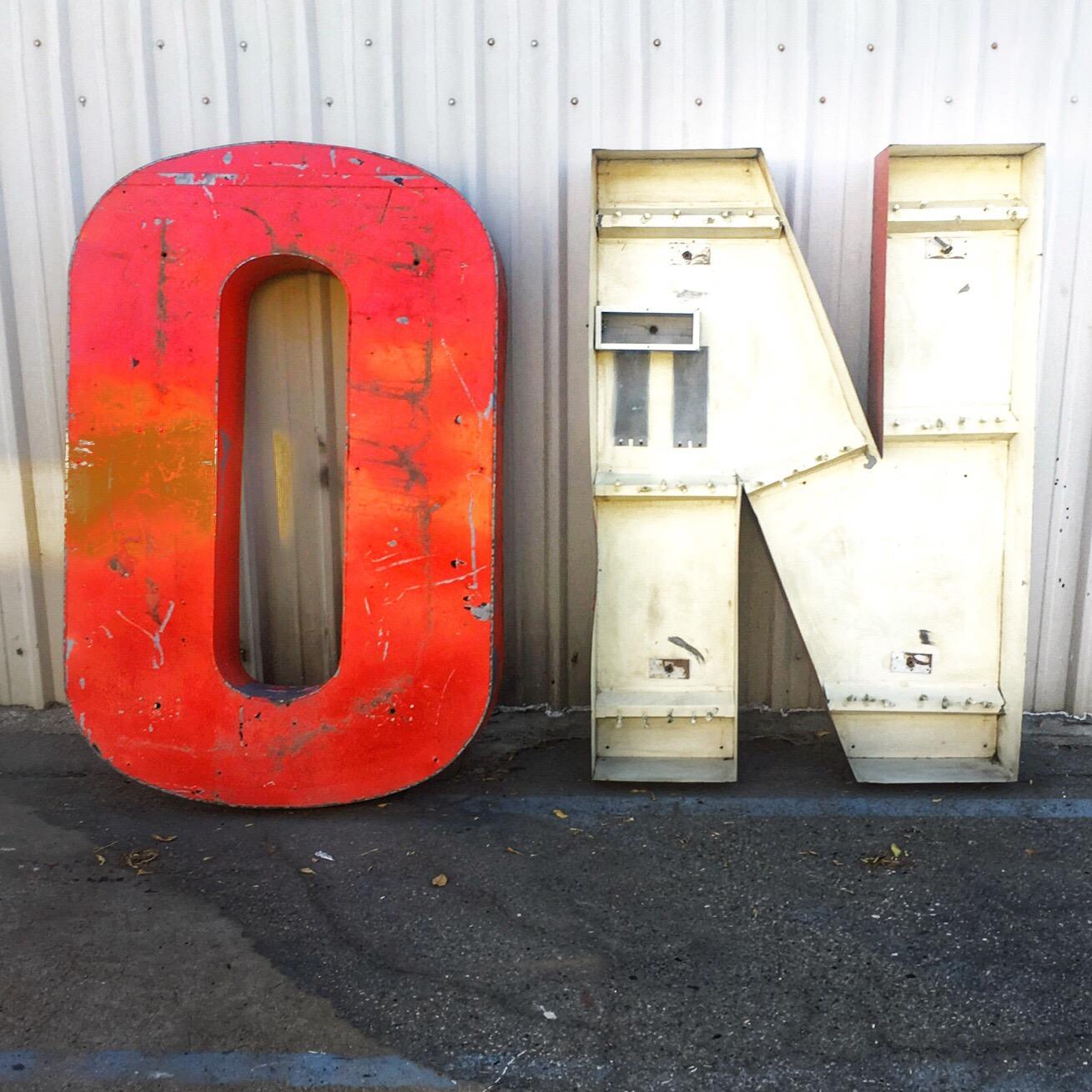 Huge weathered on Industrial sign. Very cool.

Dimensions are per letter.