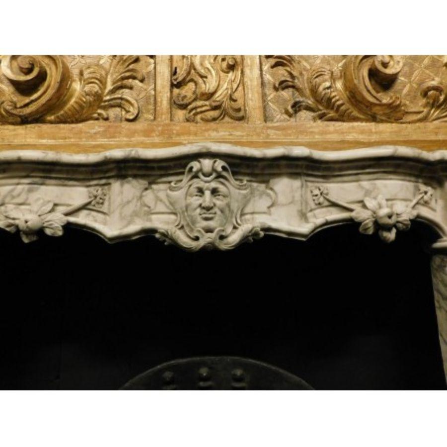 Italian Huge White Marble Fireplace mantel, richly carved with Mask and Friezes, Italy For Sale