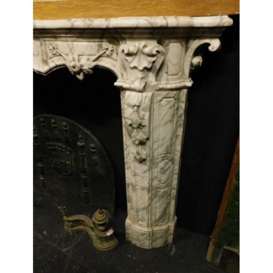 Hand-Carved Huge White Marble Fireplace mantel, richly carved with Mask and Friezes, Italy For Sale