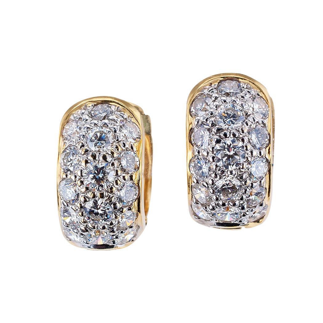 Estate Huggy diamond and 18 karat yellow gold hoop earrings.  These are the original small Huggy earrings. The thirty round brilliant-cut diamonds total approximately 1.00 carat, approximately H - I color, SI clarity.  These Huggy earrings can be
