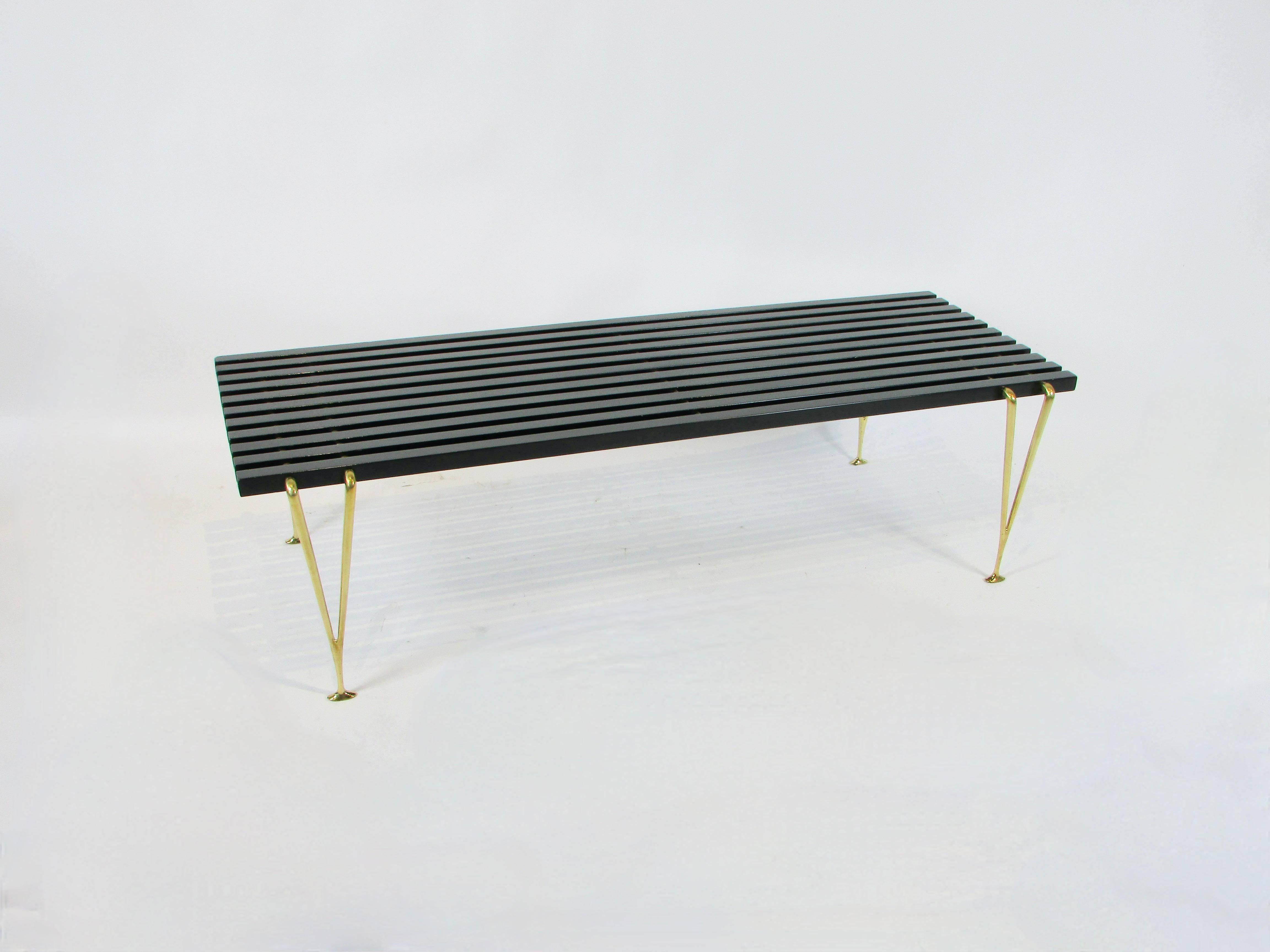 Mid-Century Modern Hugh Acton black slatted cocktail table or bench on brass legs  For Sale