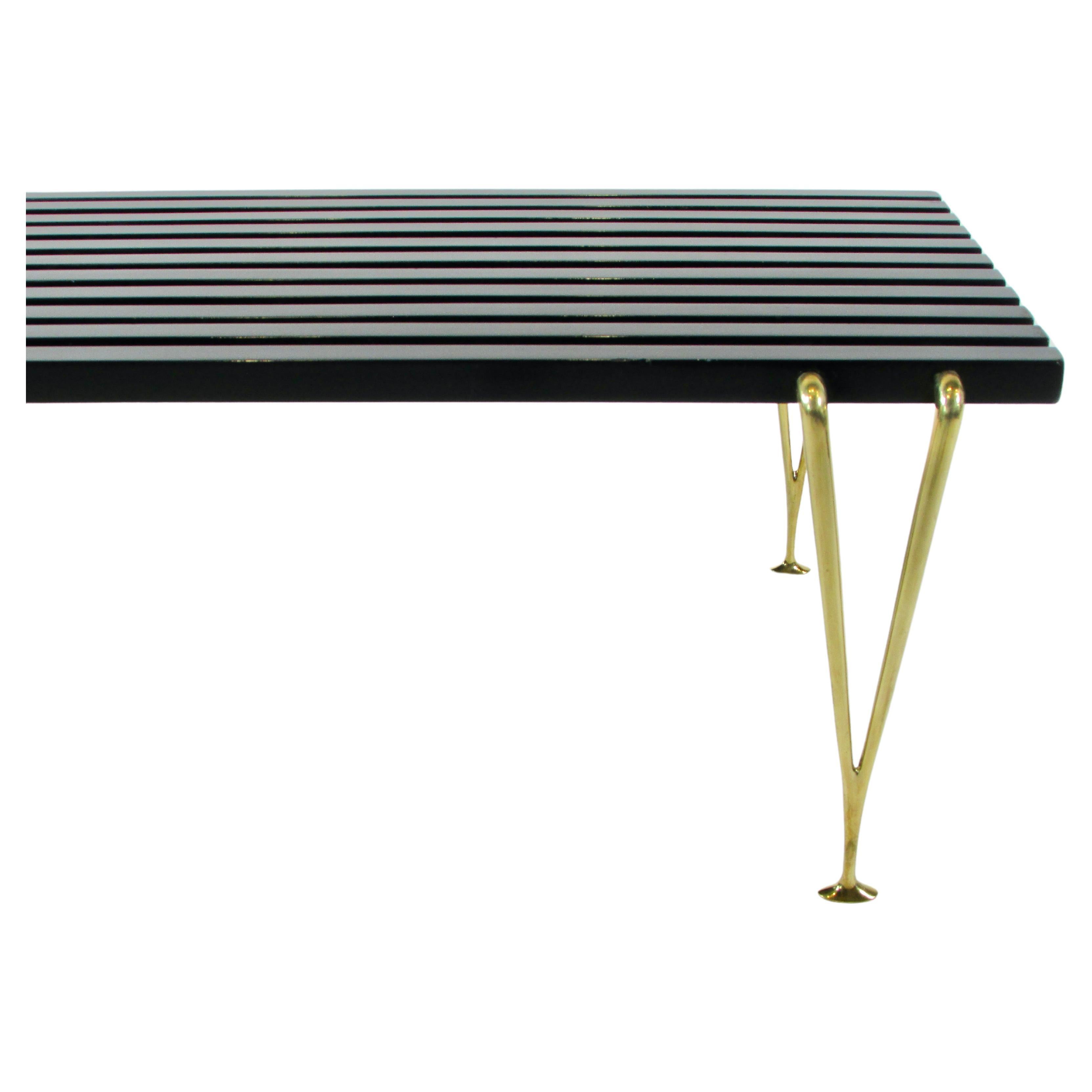 Hugh Acton black slatted cocktail table or bench on brass legs  For Sale