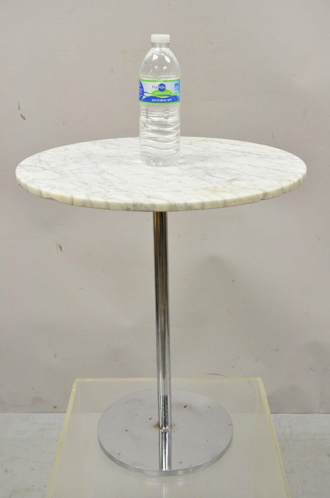 Hugh Acton round marble top chrome lollipop cocktail occasional side table. Item features a round white marble top, chrome pedestal base, nice small size, original label, clean modernist lines. Circa 1960s. Measurements: 20.25