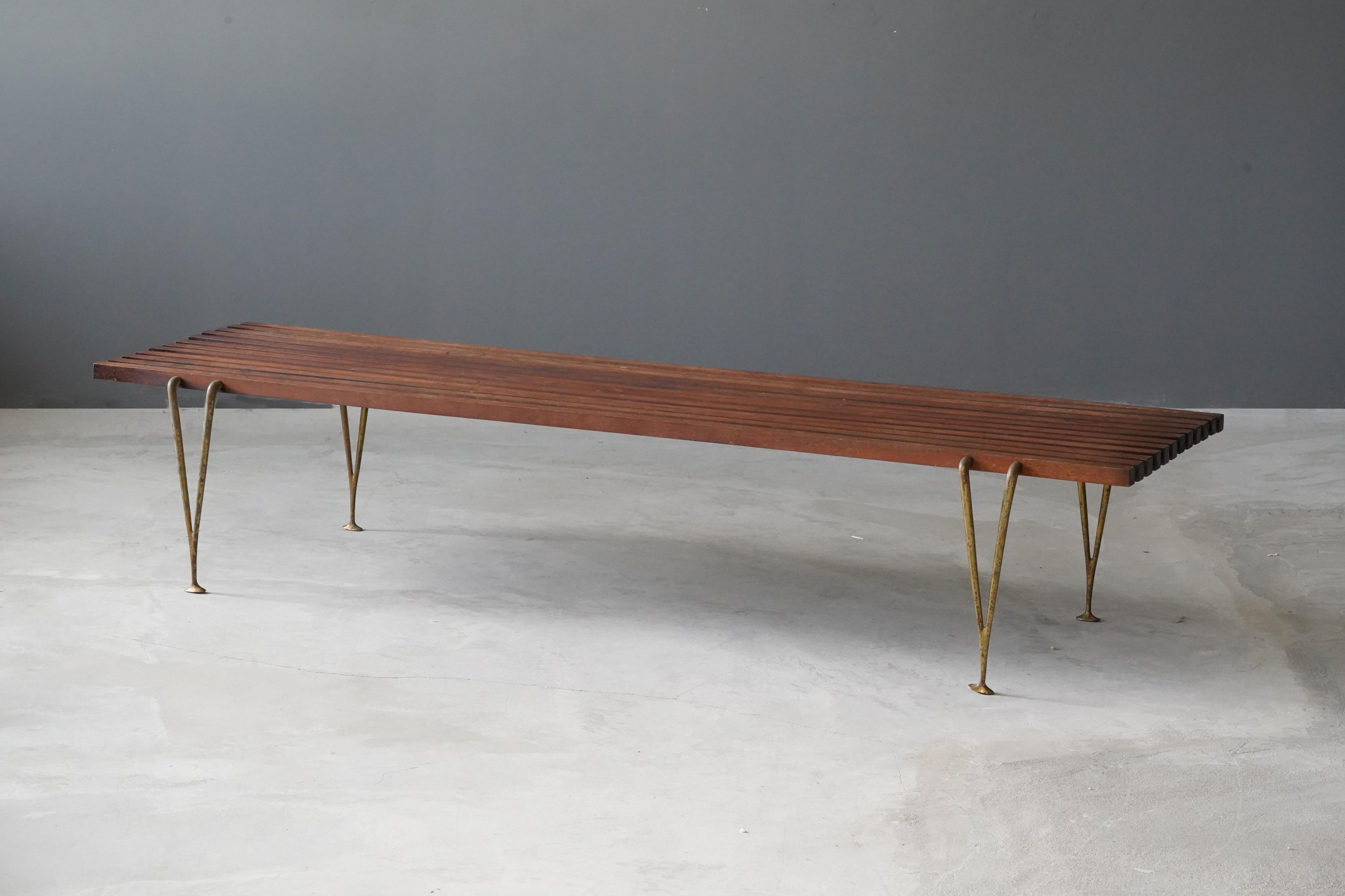 A sizable bench, designed and produced by Hugh Acton, artists studio Hugh Acton, Inc. Kalamazoo, Michigan, c. 1954. Features walnut and brass legs.

Other designers of the period include Paul Mccobb, Florence Knoll, Donald Judd, Charlotte