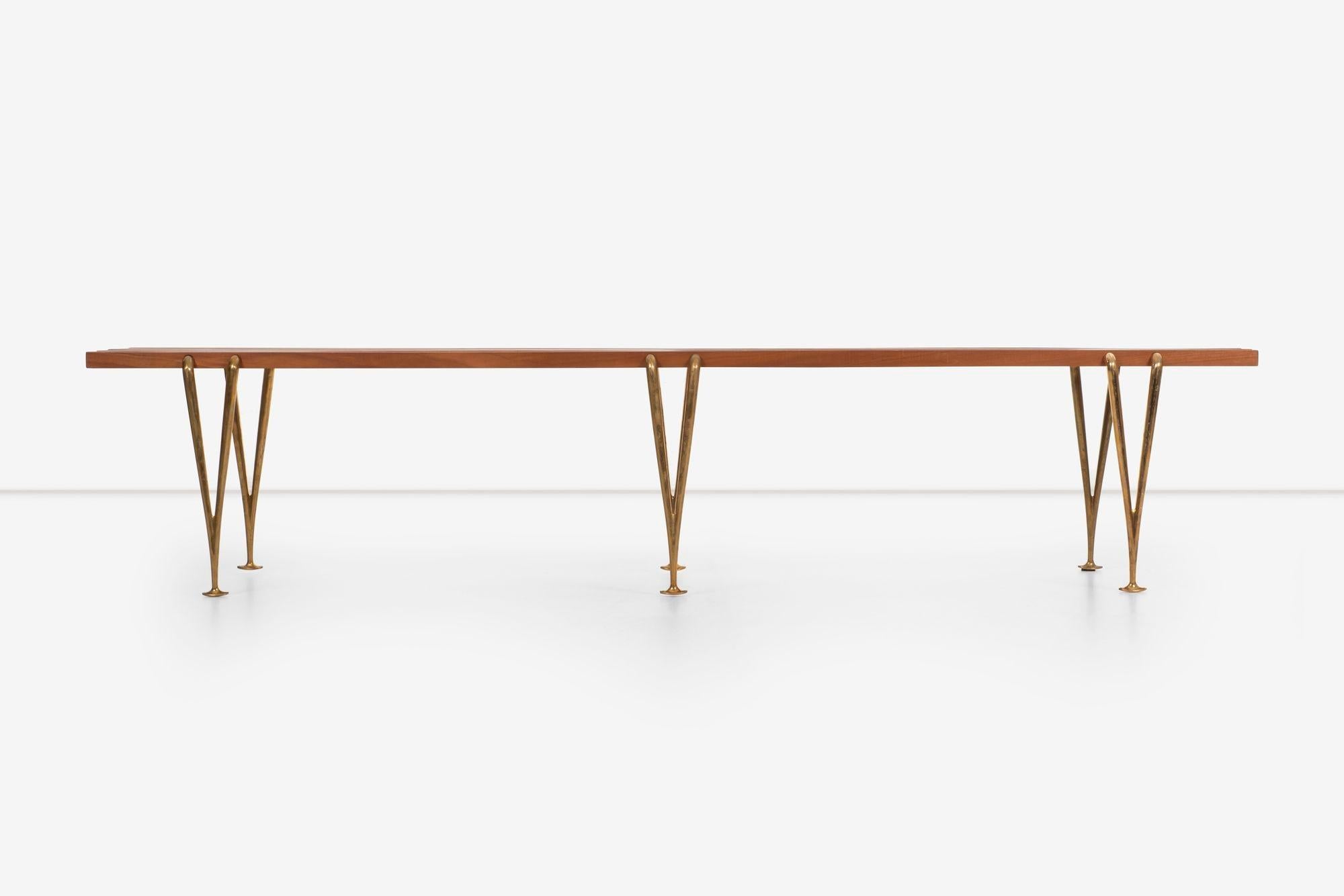 Hugh Acton Slat Bench in oiled walnut with solid brass supports. Originally designed in 1950 this later produced in a small batch by Hugh Acton Inc.