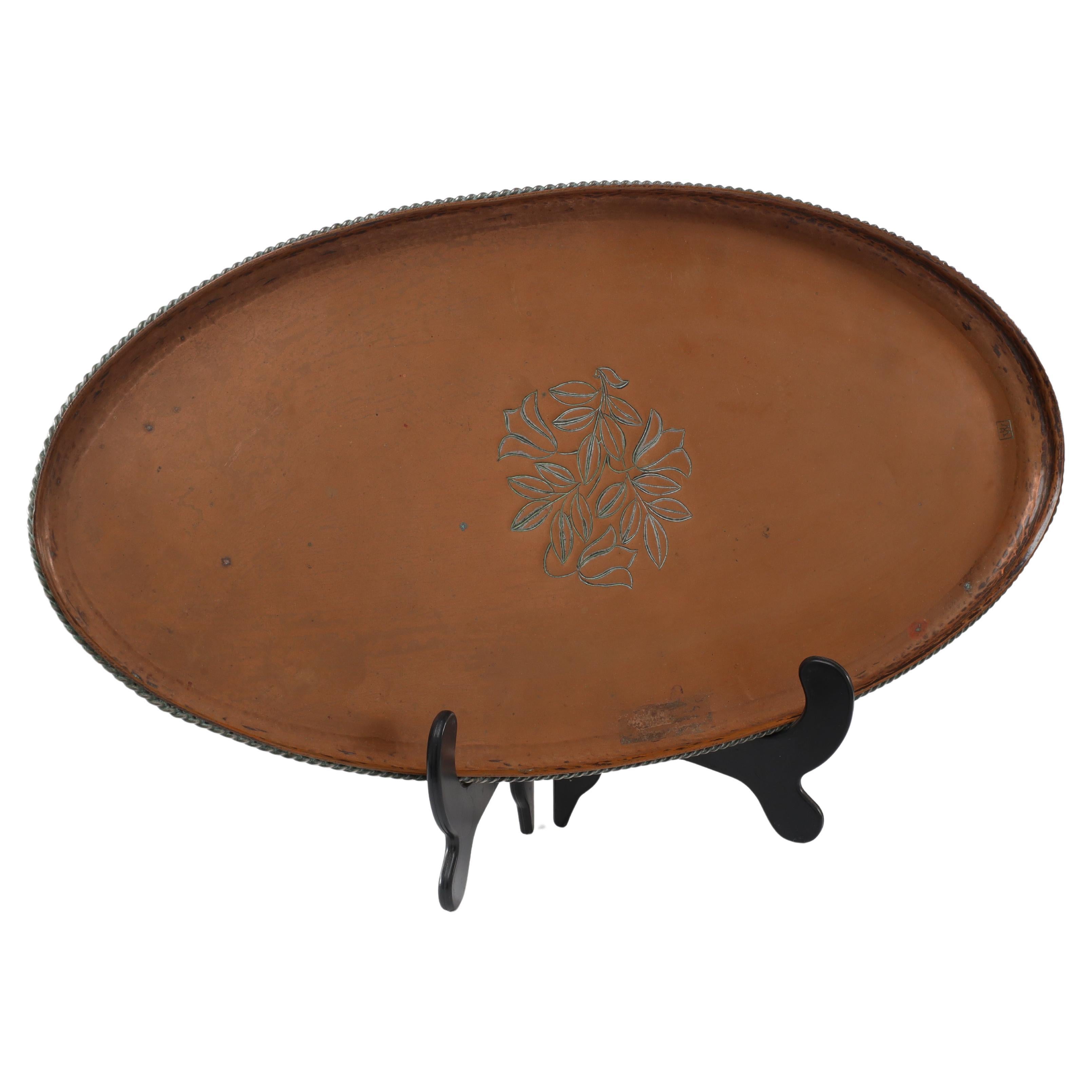Hugh Wallis. An Arts & Crafts oval copper tray with rope twist edge For Sale