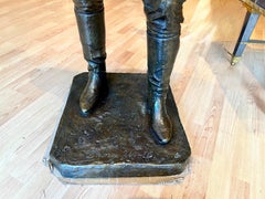 Scultura di George Woolf, fantino del cavallo da corsa Seabiscuit