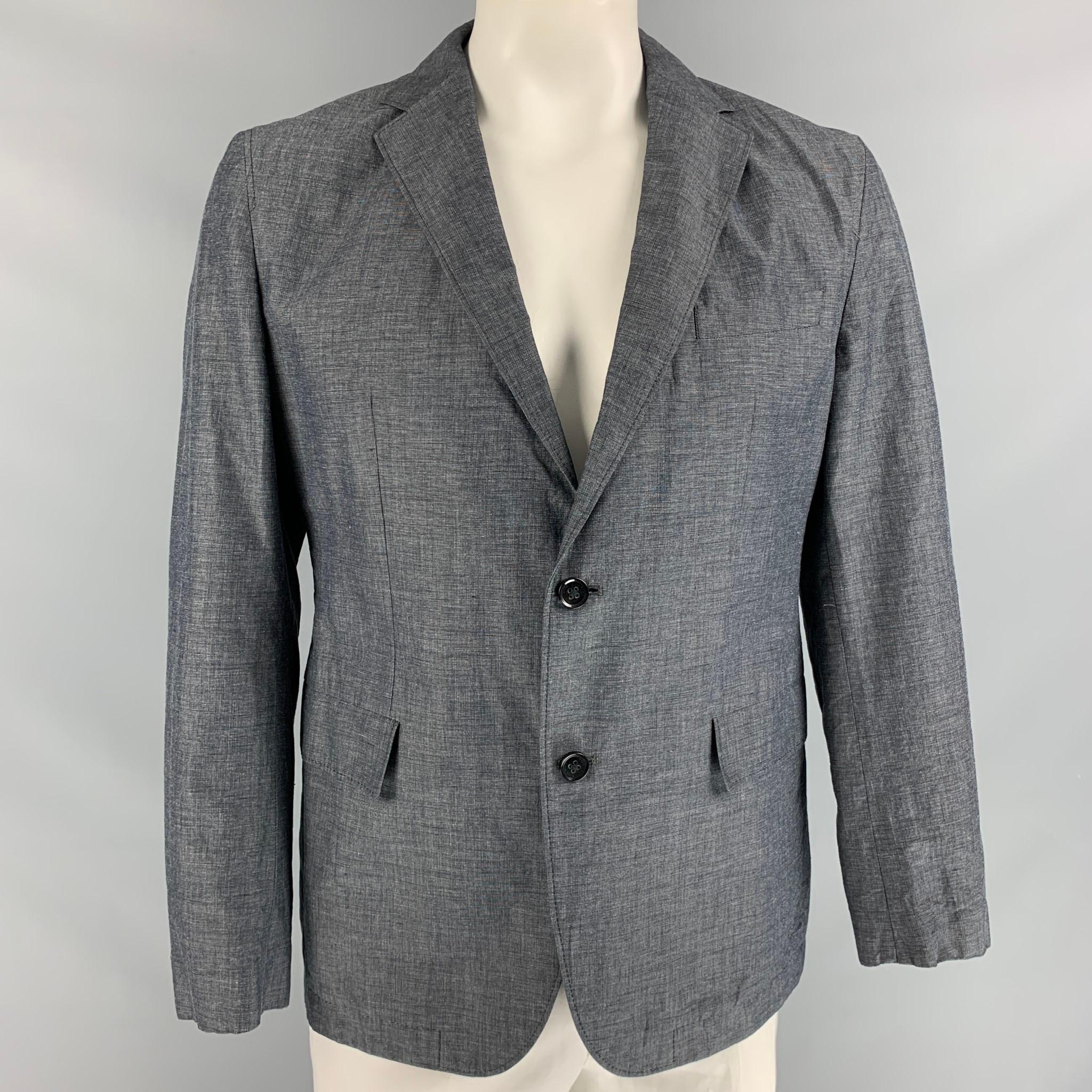 HUGO BOSS Boss by sport coat comes in Grey Polyester featuring two button closure, straight flap pockets and notch lapel.

Excellent Pre-Owned Condition. 
Marked: 40

Measurements:

Shoulder: 18 in
Chest: 46 in
Sleeve: 25 in
Length: 29 in

 

