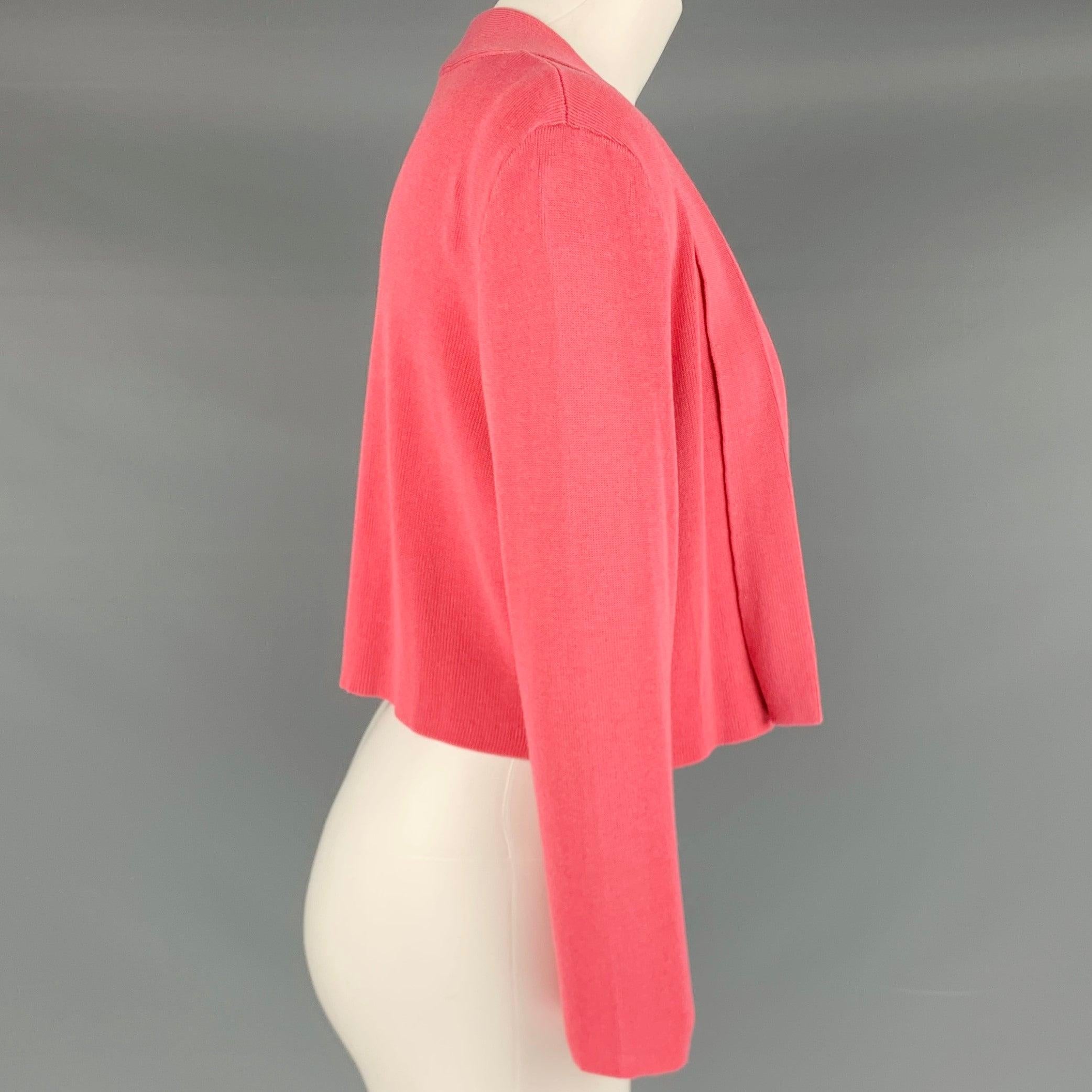 BOSS by HUGO BOSS cardigan
in a stretchy pink viscose cotton blend knit featuring an open front style and cropped length.Excellent Pre-Owned Condition. 

Marked:   S 

Measurements: 
 
Shoulder: 17.5 inches Bust: 37 inches Sleeve: 18 inches Length: