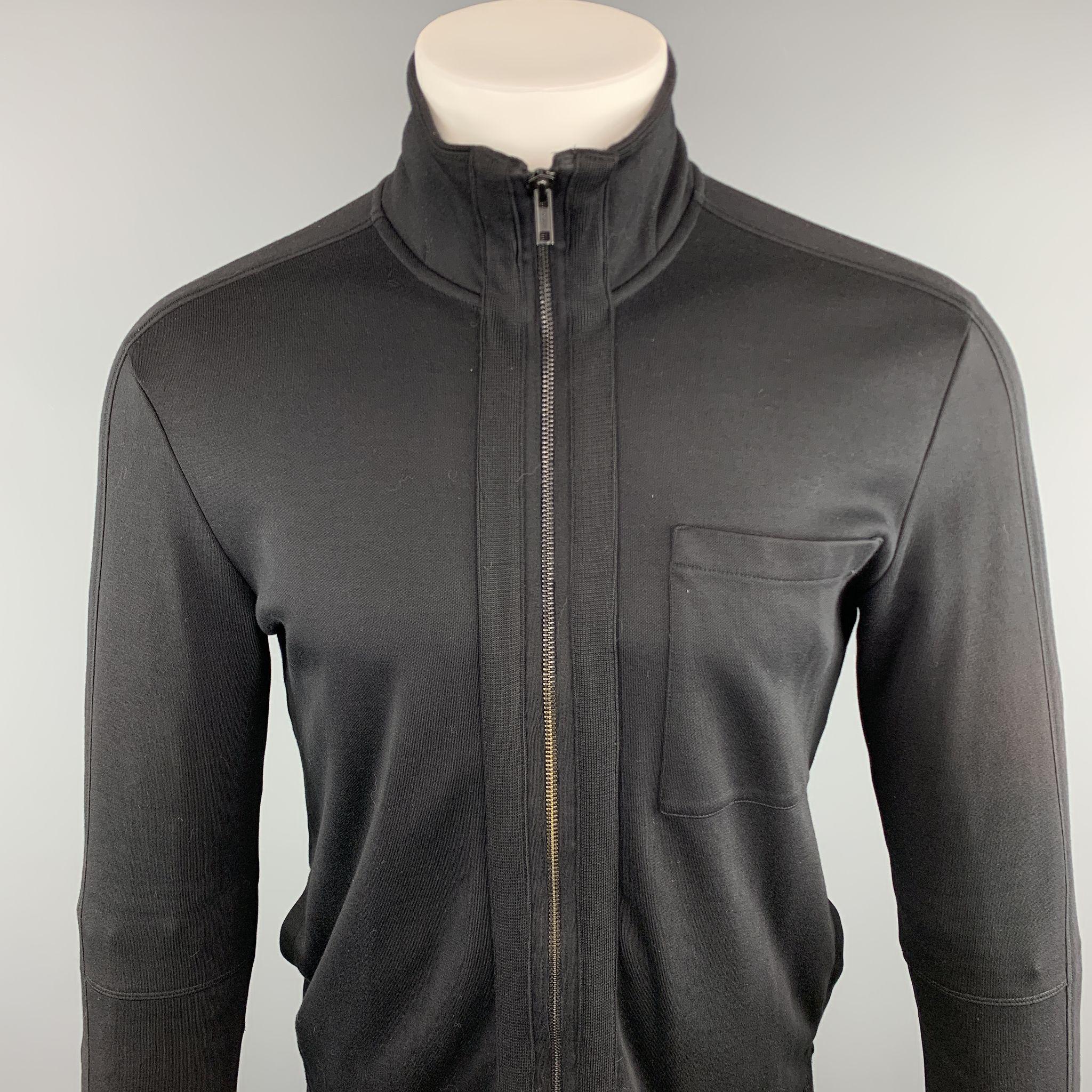 HUGO BOSS Jacket comes in a black cotton featuring a front patch pocket and a full zip closure. 

Excellent Pre-Owned Condition.
Marked: S

Measurements:

Shoulder: 17.5 in. 
Chest: 38 in. 
Sleeve: 26 in. 
Length: 26 in. 