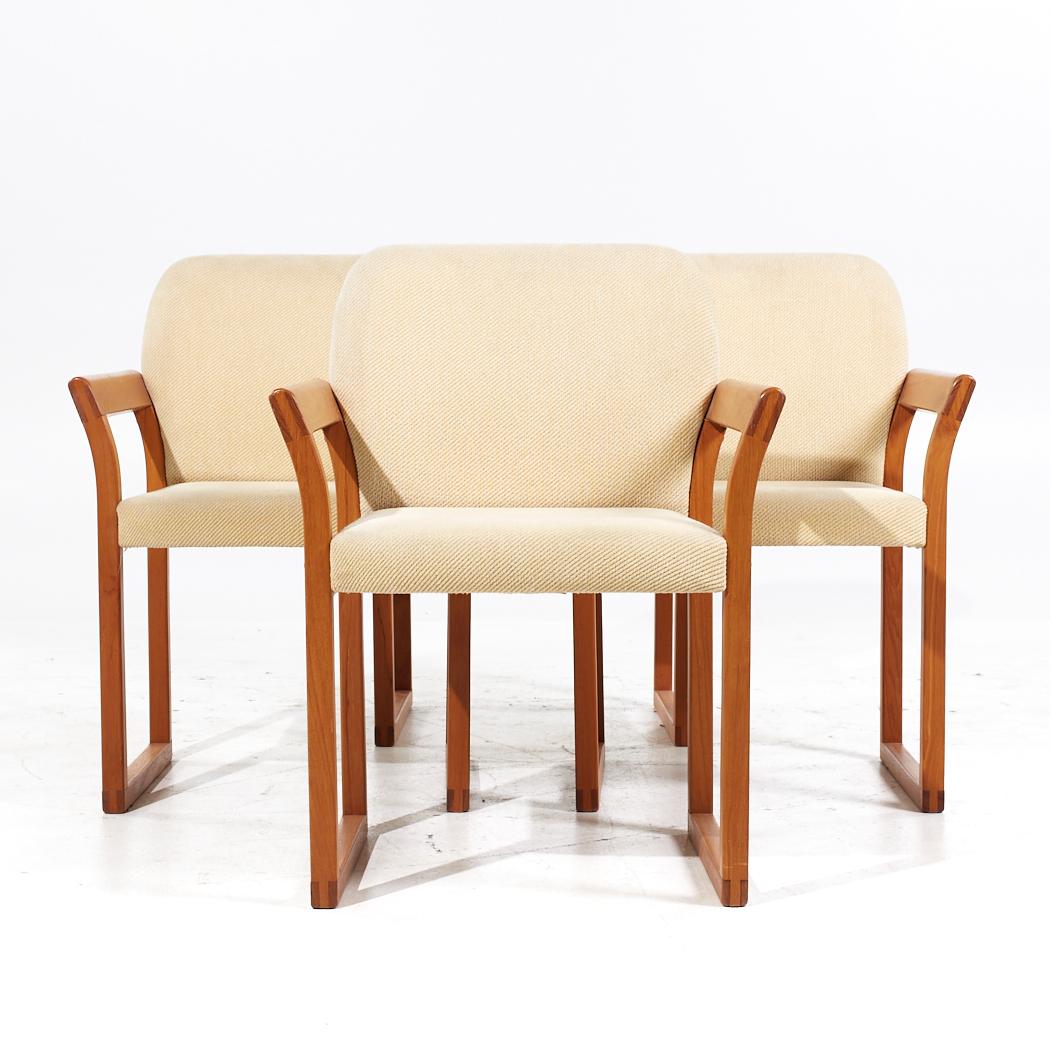 Hugo Frandsen for Stolefabrik Mid Century Danish Teak Dining Chairs - Set of 4

Each chair measures: 24.5 wide x 23 deep x 32 inches high, with a seat height of 18 and arm height/chair clearance of 24.5 inches

We take our photos in a controlled