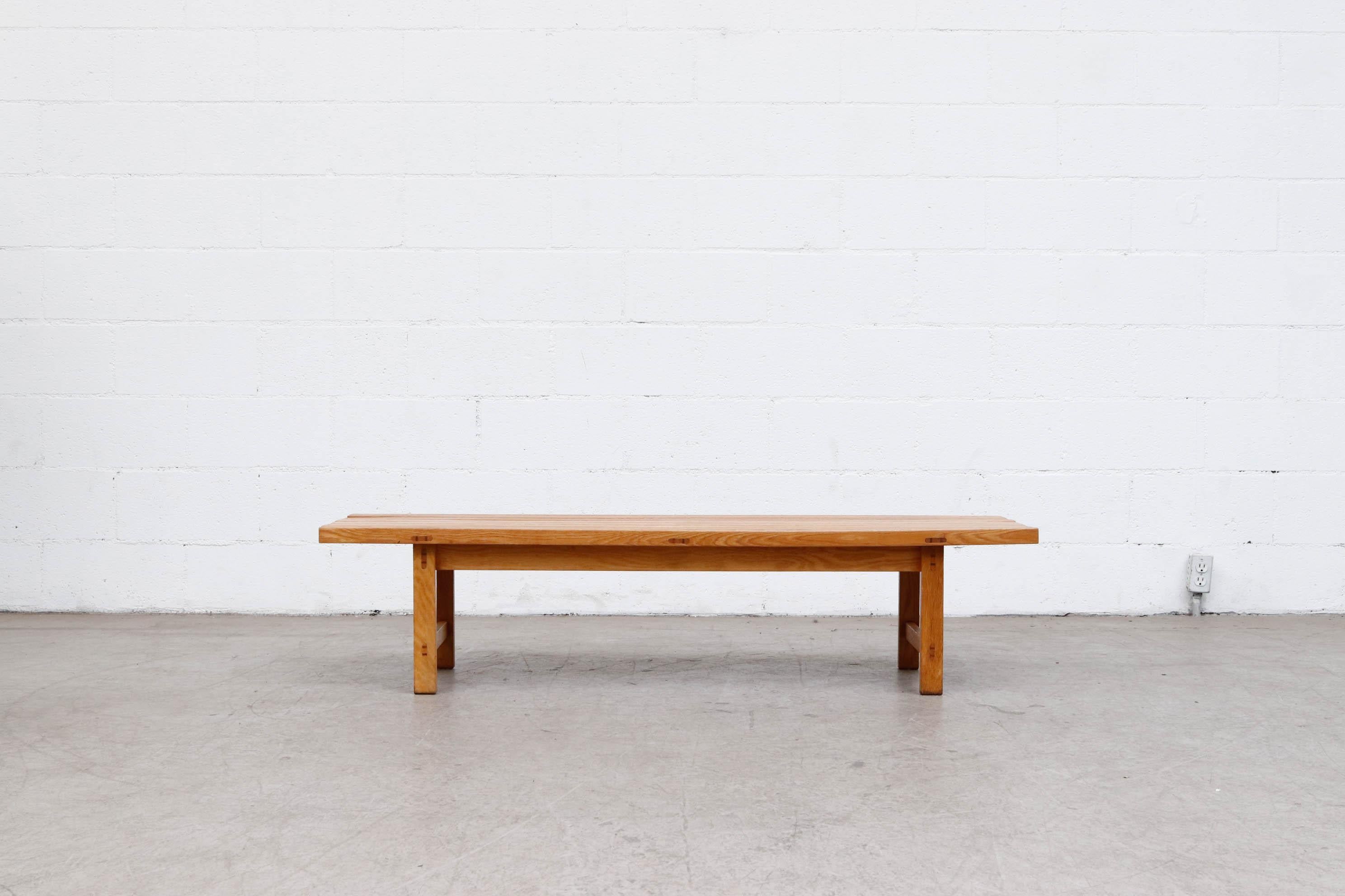 Midcentury Hugo Svensson oak slat bench for Bjärnums Möbelfabriker AB. Beautiful construction. Both in good original condition with wear consistent with their age and use.