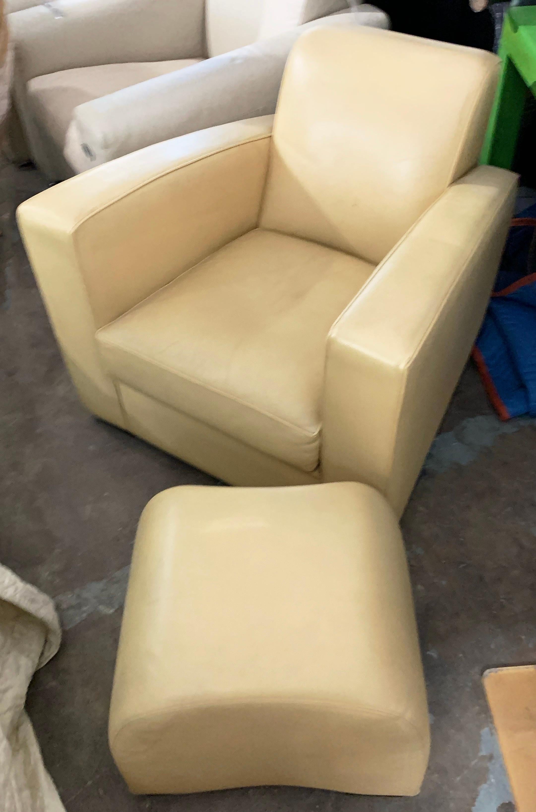 Hugues Chevalier citizen leather armchair and Yang ottoman set.  Citizen chair and Yang ottoman set from the Iconic collection by Hugues Chevalier, France. Please see photos two and three for the most accurate representation of color. Photo one
