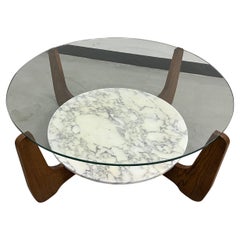 Tavolino Hugues Poignant in marmo e vetro