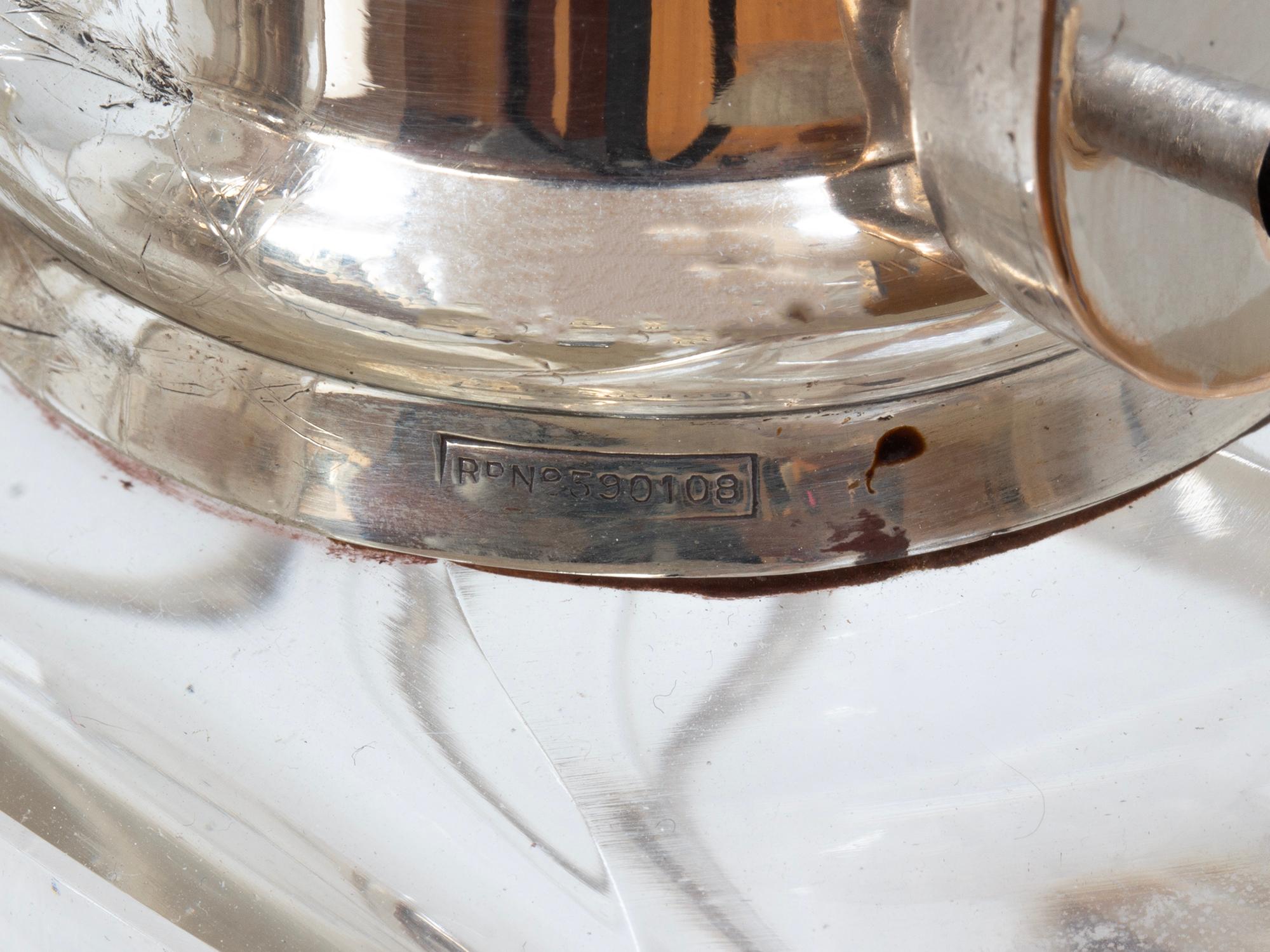 Hukin & Heath Pair of Silver Tilting Liquor Decanters For Sale 10