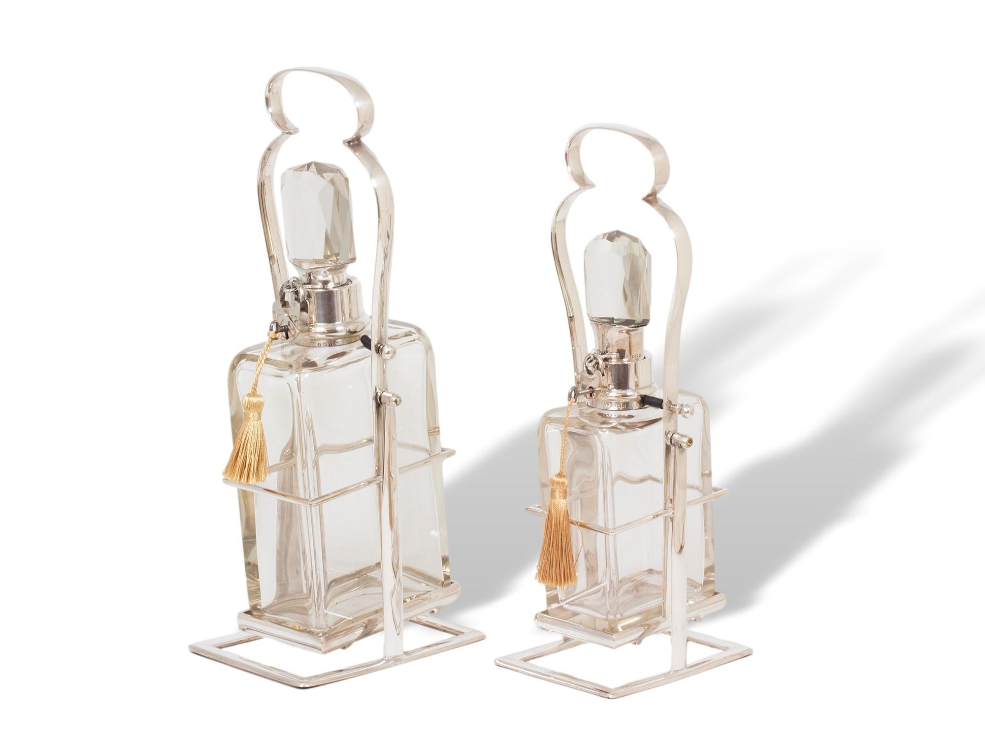 Free Worldwide Shipping

Manufactured by Hukin & Heath

From our Decanter collection, we are pleased to offer this Silver Mounted Pair of Tilting Decanters by Hukin & Heath. The Decanters with faceted stoppers fitted in the original silver plate