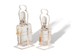 Hukin & Heath Pair of Silver Tilting Liquor Decanters