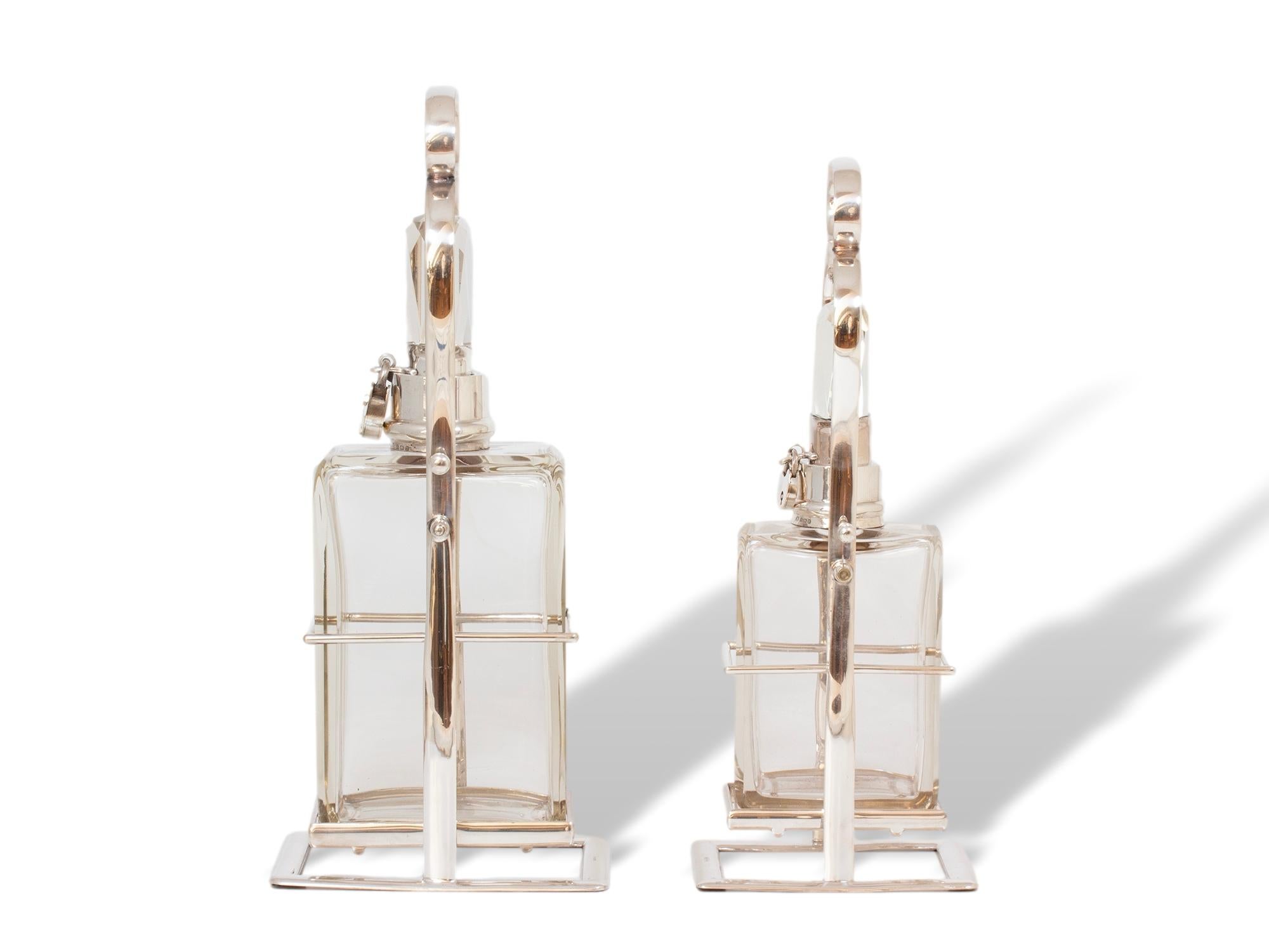 Art Nouveau Hukin & Heath Pair of Silver Tilting Liquor Decanters For Sale