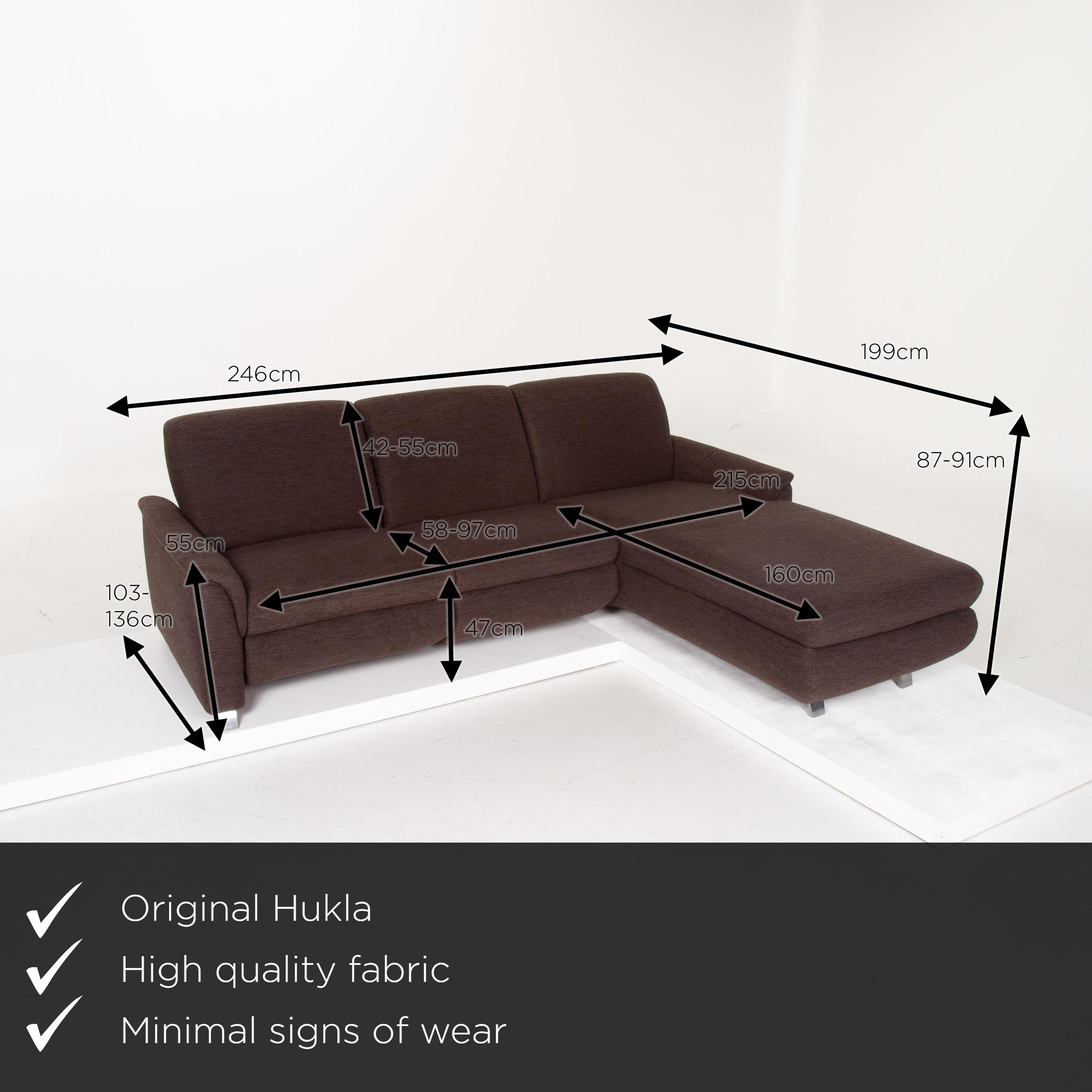 We present to you a Hukla fabric sofa brown corner sofa.

 

 Product measurements in centimeters:
 

Depth 103
Width 246
Height 87
Seat height 47
Rest height 55
Seat depth 58
Seat width 215
Back height 42.