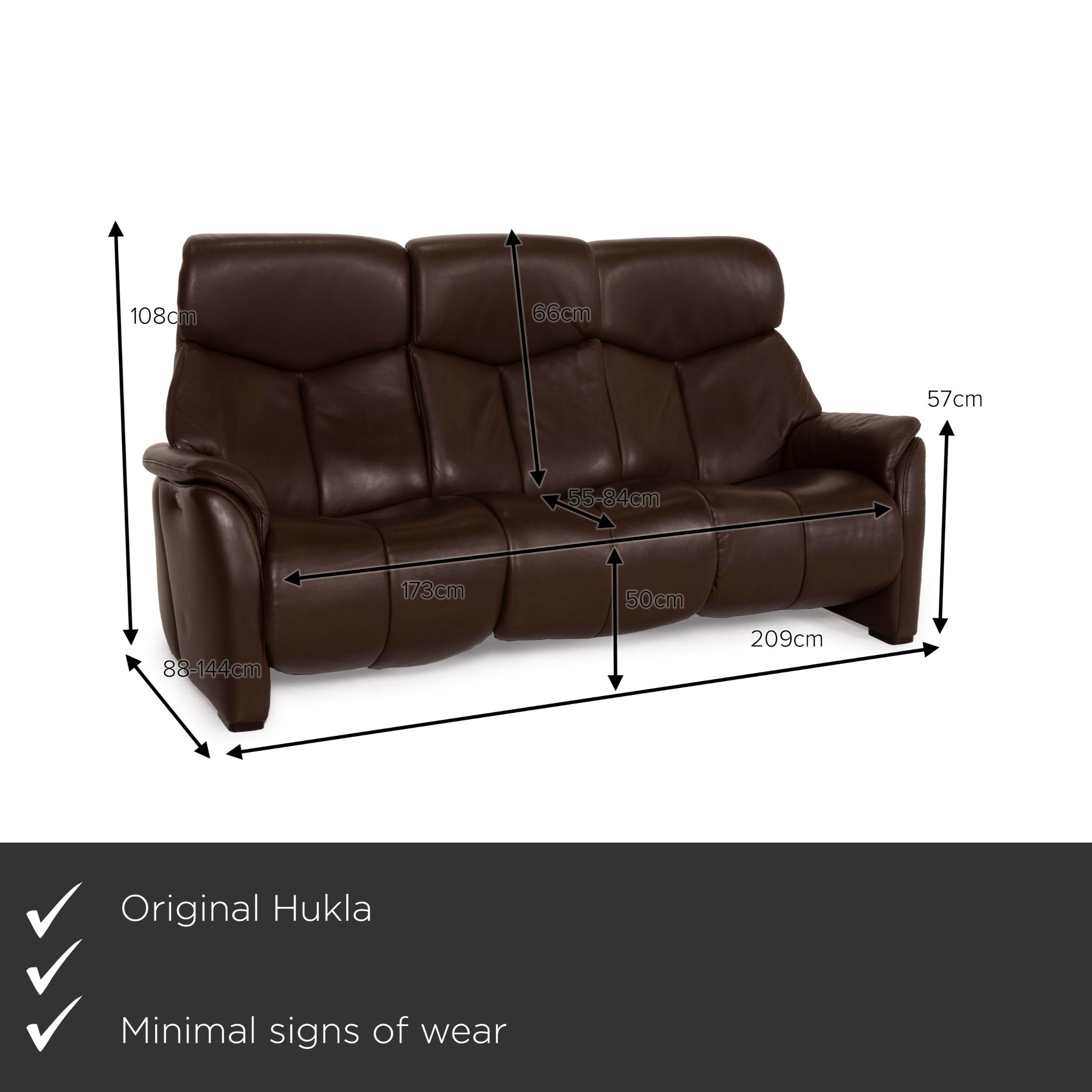 We present to you a Hukla Nevada leather sofa brown three-seater electric relaxation function dark.
  
 

 Product measurements in centimeters:
 

 depth: 88
 width: 209
 height: 108
 seat height: 50
 rest height: 57
 seat depth: 55
