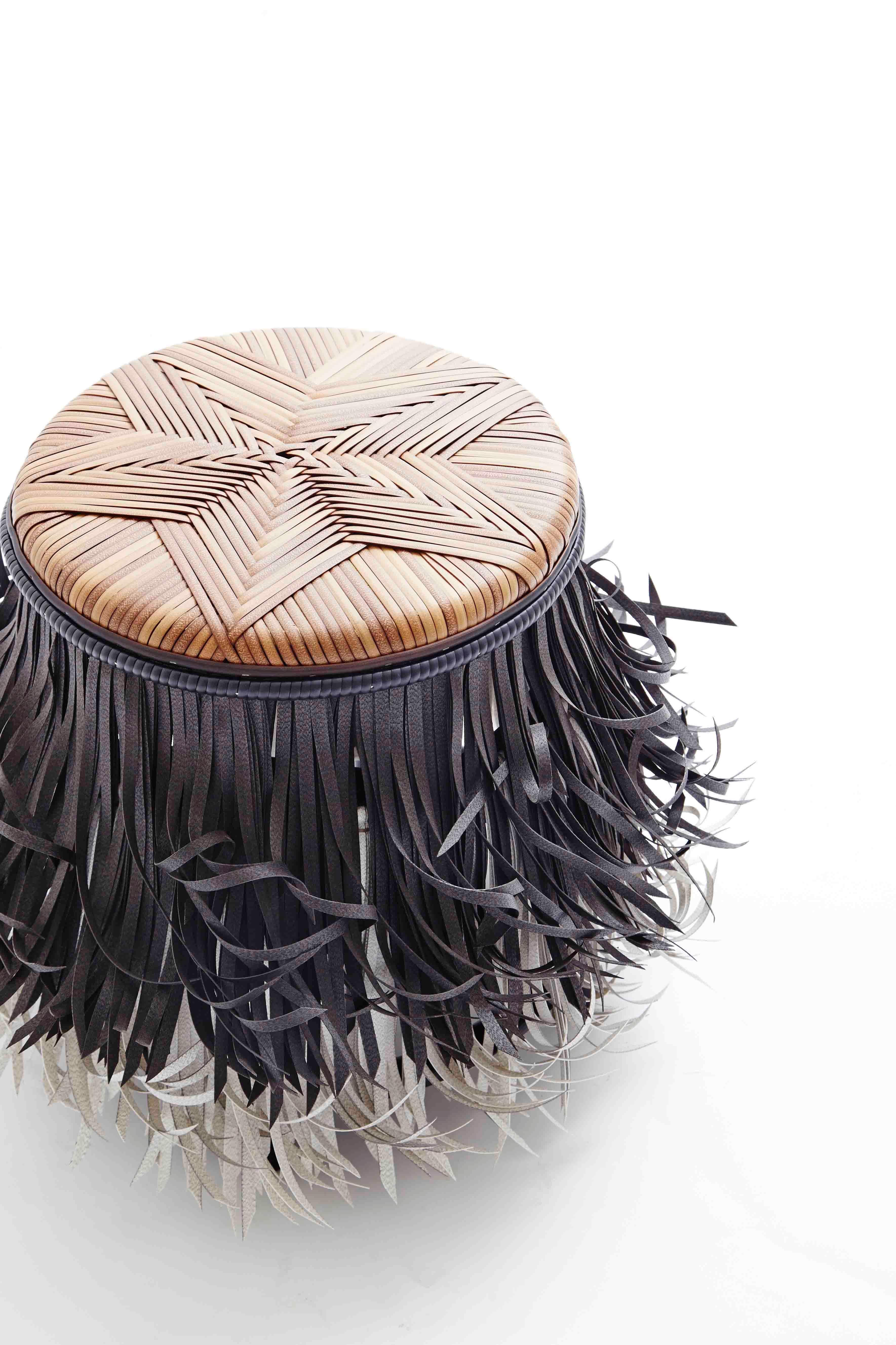 Hula was inspired by the shape and movement of Hawaiian dancers’ skirts. The seat referenced and resized the star pattern from traditional Thai sticky rice basket. The body was constructed using techniques from the palm leaf roofing tiles executed