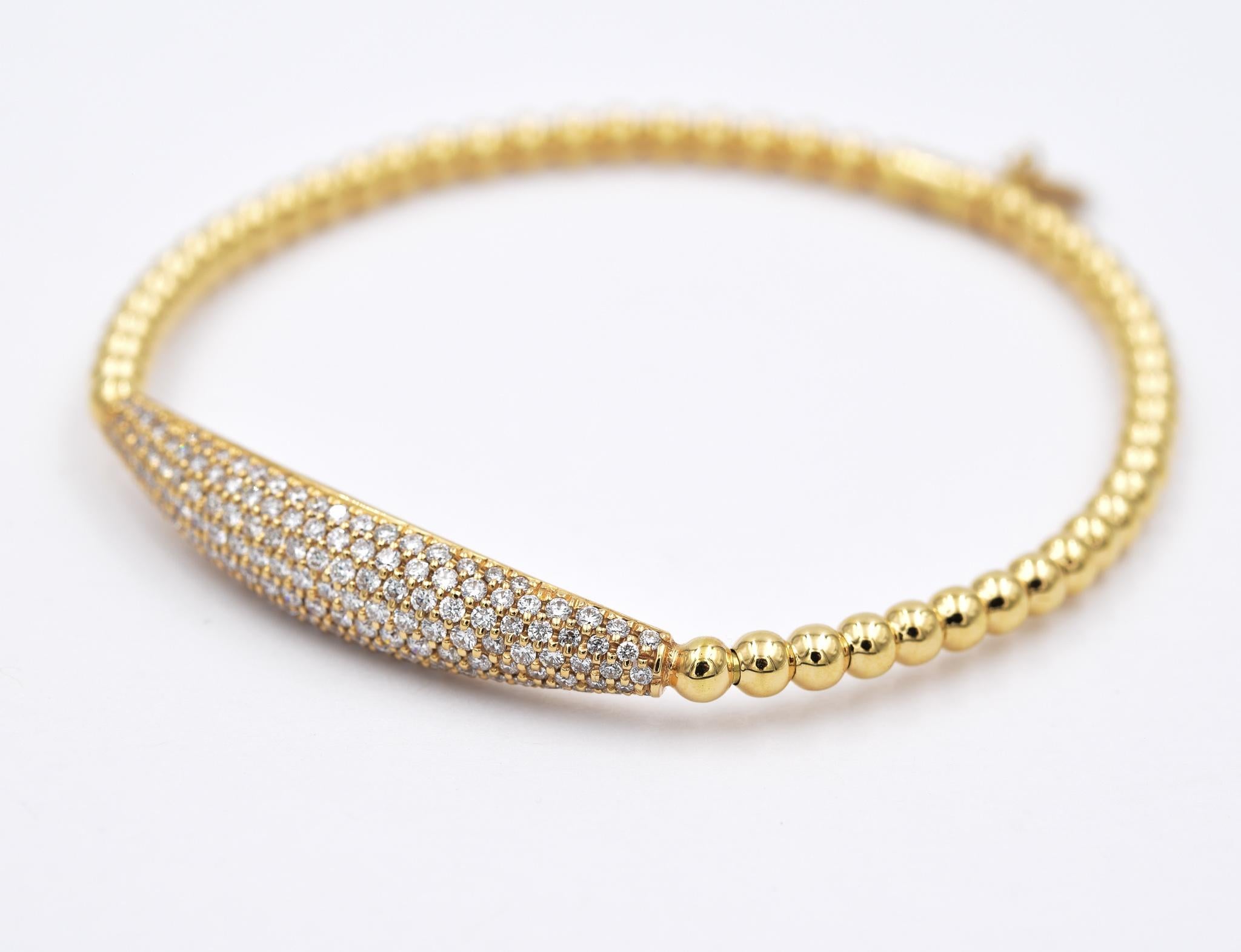 Hulchi Belluni diamond pavé dome stretchable bracelet from the Tresore Collection in 18k yellow gold set with high quality white diamonds. Also available in White Gold and Rose Gold.

1.10ctw of diamond pavé
Beaded & stretchable for extra comfort &