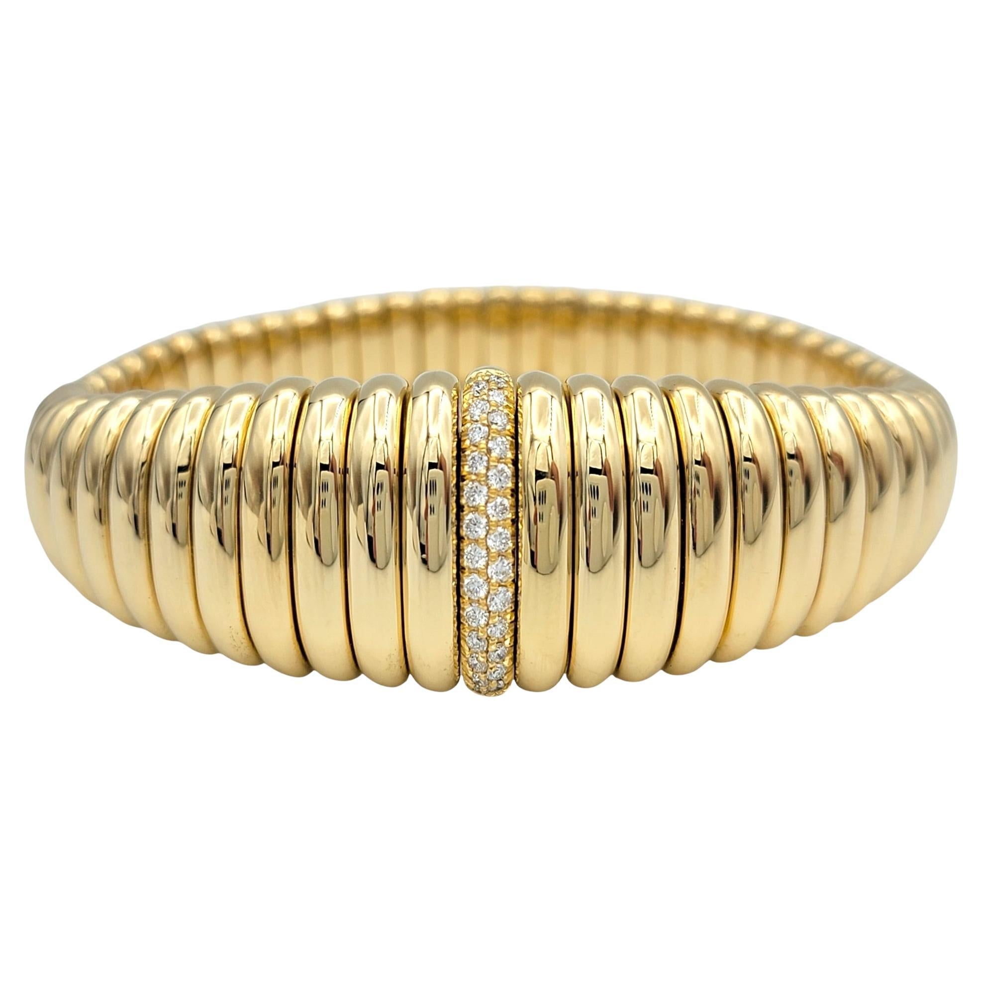 Hulchi Belluni Bracelet manchette tresore extensible graduée en or 18 carats et diamants