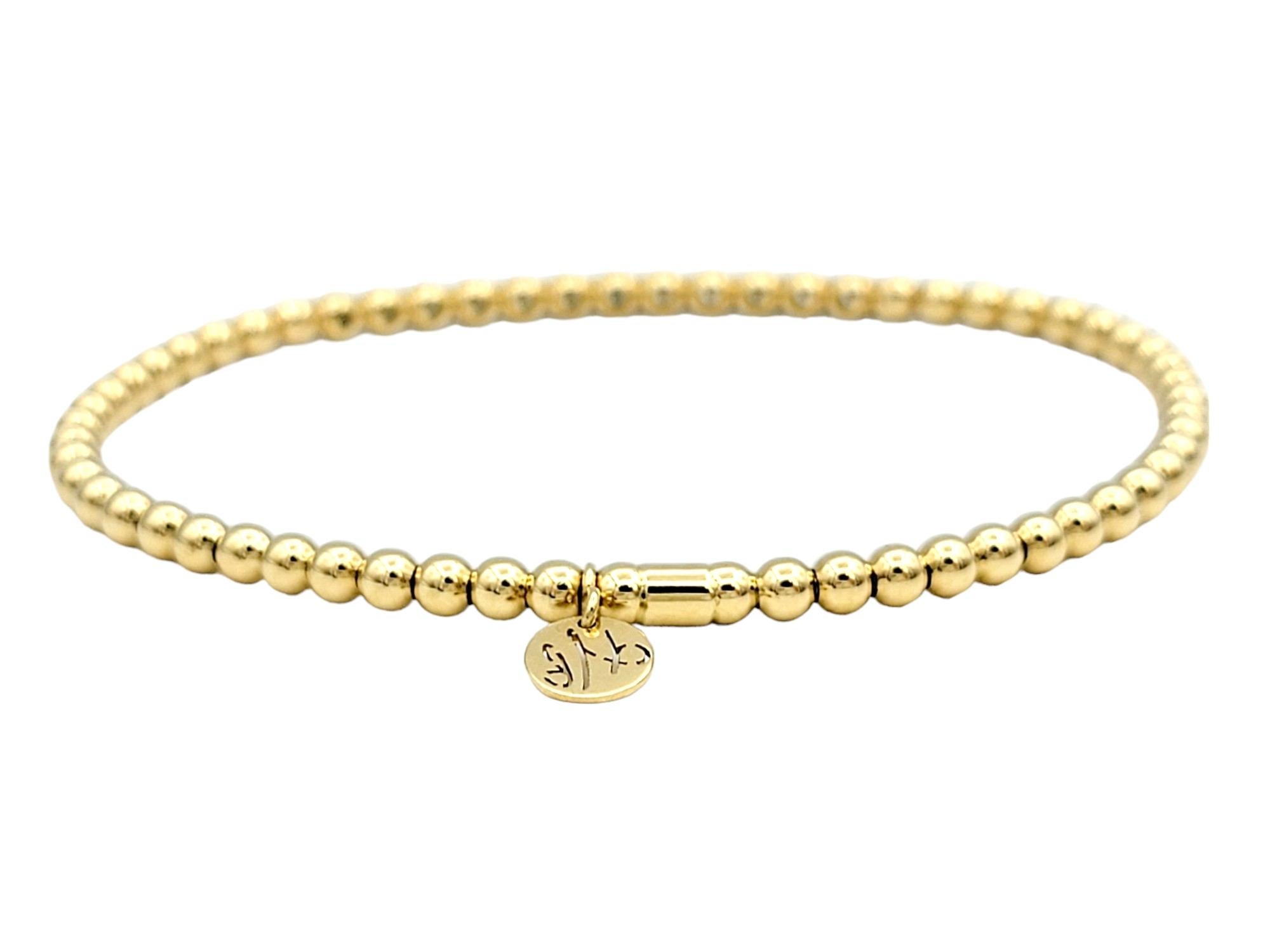 Taille ronde Hulchi Belluni Tresore Collection, bracelet extensible de 3 mm en or jaune et diamants en vente