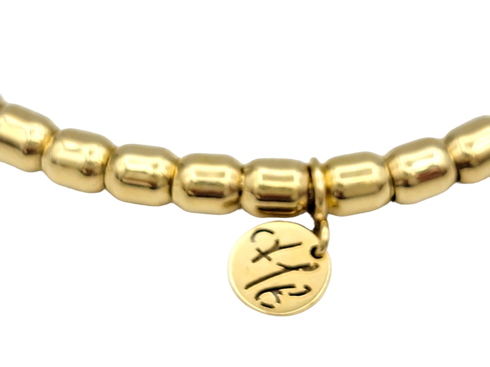 Hulchi Belluni Tresore Collection Bracelet extensible croix en or jaune 18 carats et diamants en vente 1