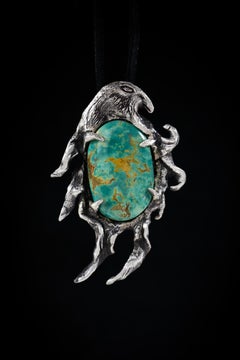 Human to Eagle (Manassa Turquoise, Sterling Silver Pendant) by Ken Fury
