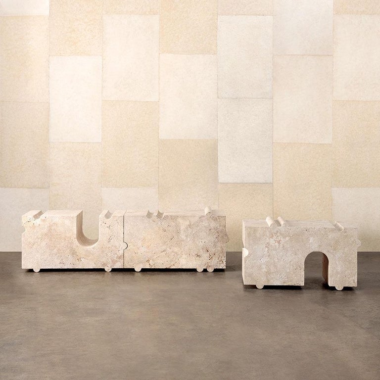 The Hume modular stone bench consists of a versatile series of three of uniquely carved stone blocks that straddle the line between sculpture and functional design. When used together, the pieces form a console or bench, depending on the