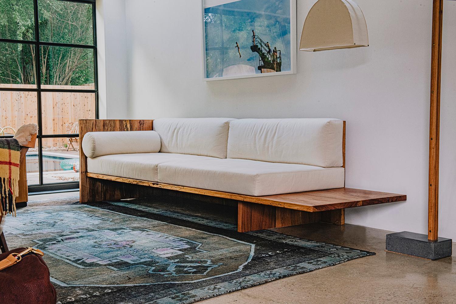 The Humphreys sofa draws inspiration from the organic minimalism of Donald Judd’s daybed. The shape is left open on the right side, designed to be intentionally long for two people to lay comfortably. It follows the same ethos as the brand's Taylor