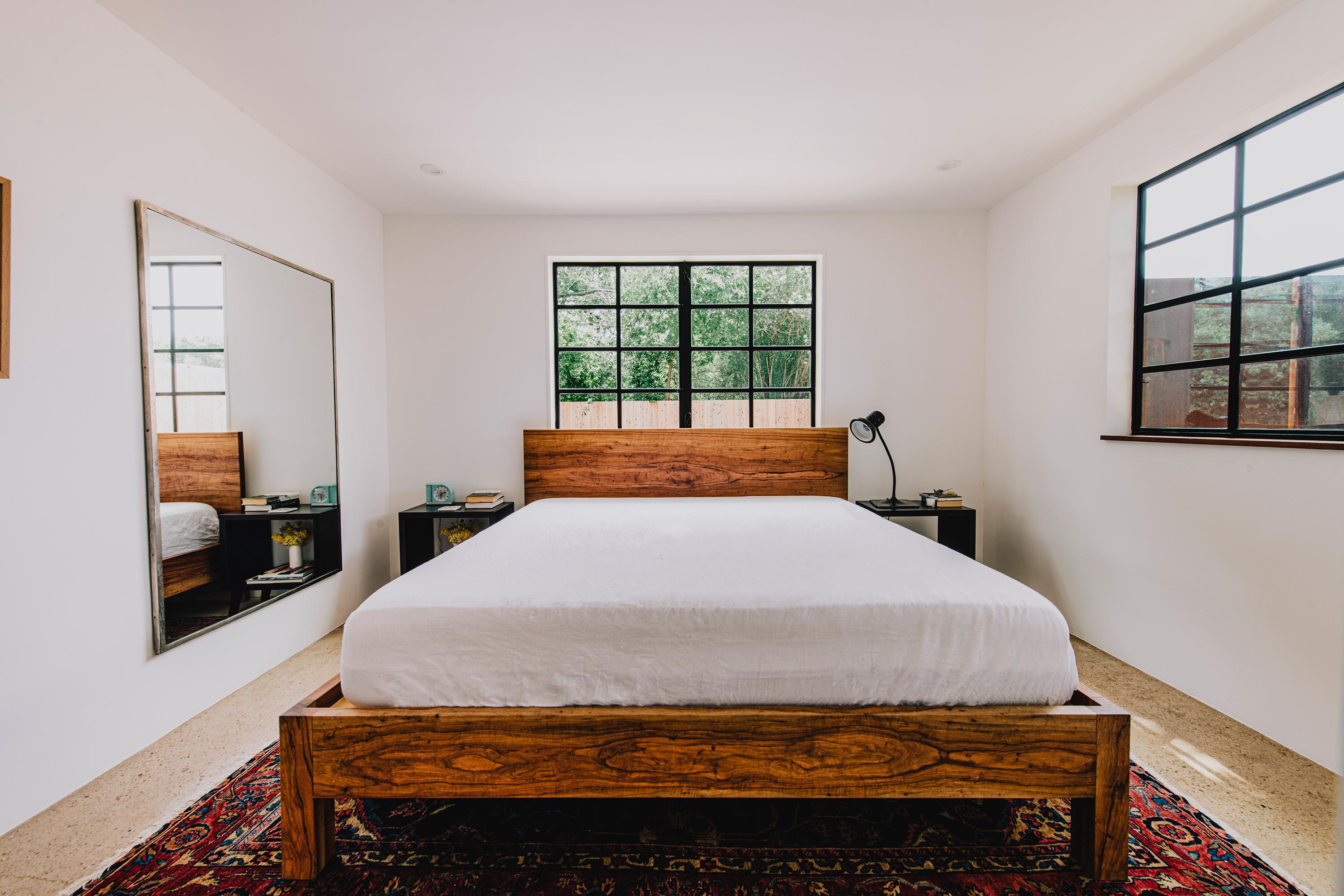 The Taylor bed is uncomplicated in its basic shape, the grain of the wooden frame gives a sense of natural depth. The luxury of this piece lays in the material used and the energy invested in its construction with solid slabs of American Pecan wood