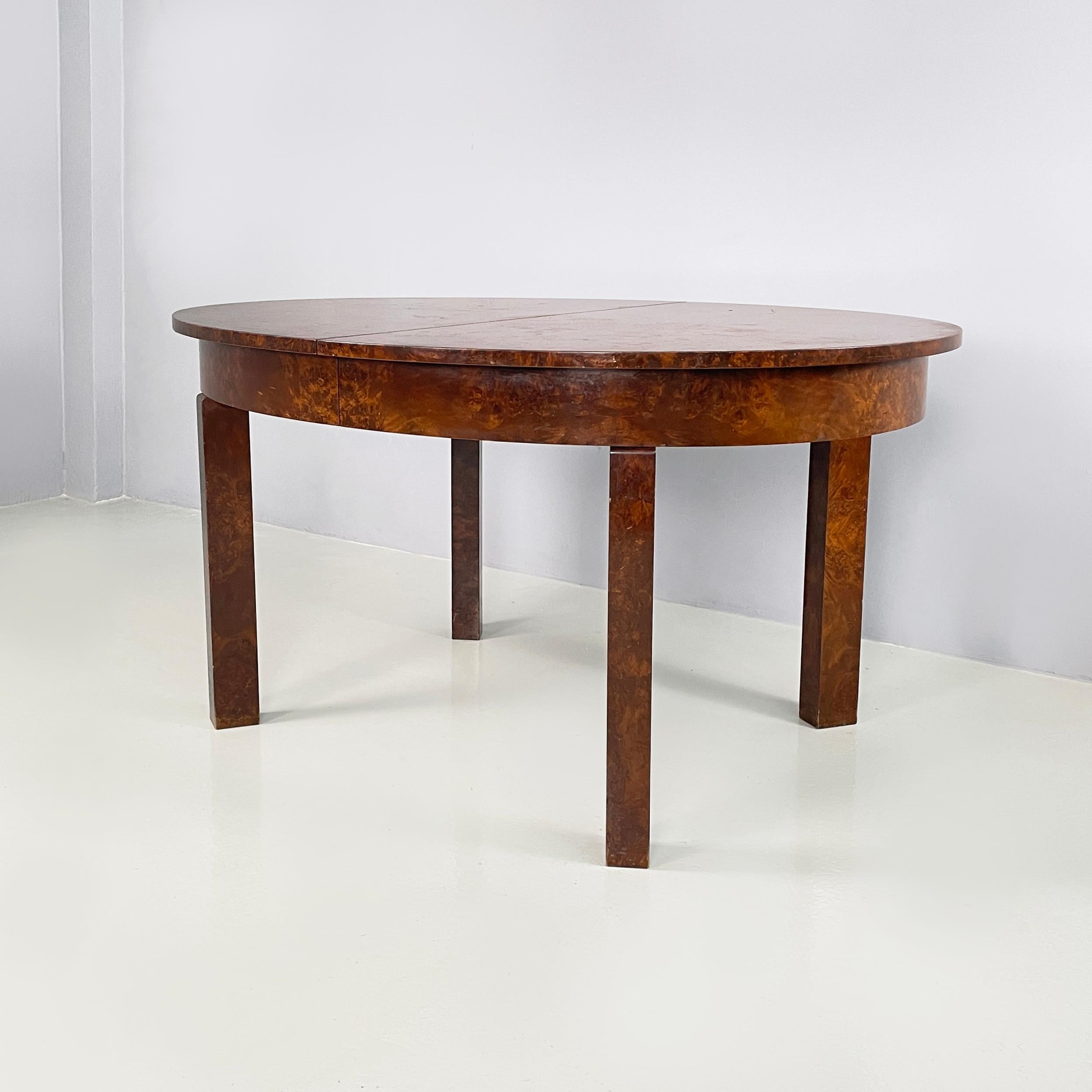 Hungarian art deco Oval dining table in wood, 1930s
Dining table with oval top with slight overhang, entirely in dark wood. The legs have a rectangular section. From Art deco period.ì
1930s. Of Hungarian origin.
Good conditions. The top has several