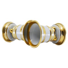 Hungarian ceramic jugs fitted with gilded silver bases