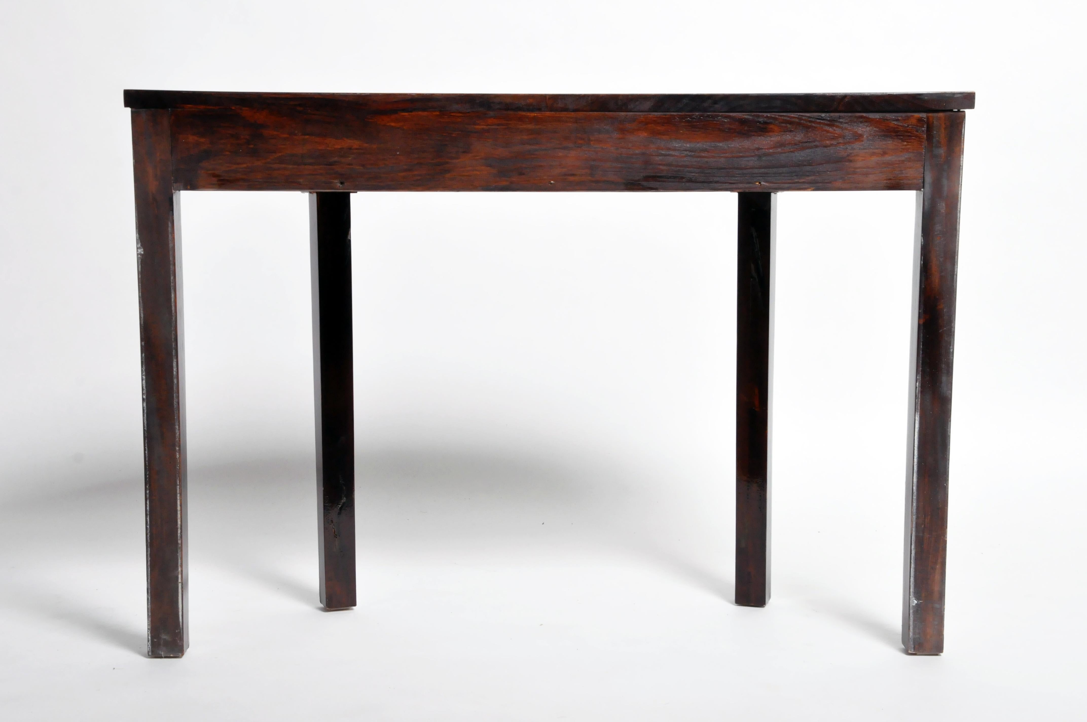 This elegant console table is from Budapest, Hungary and was made from walnut veneer, circa 21st Century. The piece features a drawer for storage. Wear and tear consistent with age and use.