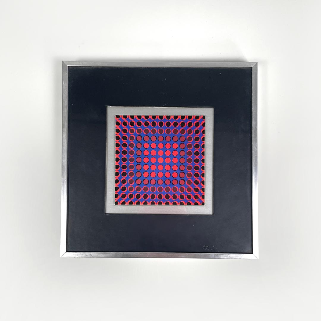 Tableau moderne hongrois d'art optique avec cadre en métal de Victor Vasarely, années 1970
Peinture avec cadre en métal. Le tableau représente une composition géométrique colorée dans le plus pur style de l'Optical Art, avec deux tons de rouge, de