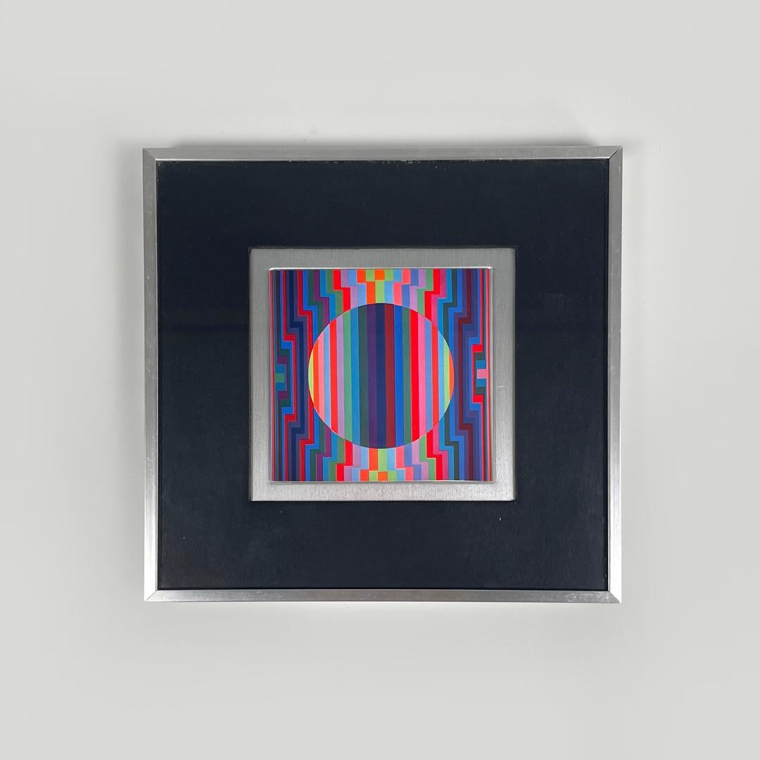 Tableau moderne hongrois d'art optique avec cadre en métal par Victor Vasarely, années 1970
Peinture avec cadre en métal. Le tableau représente une composition géométrique colorée dans le plus pur style de l'Optical Art, avec des nuances de rouge,