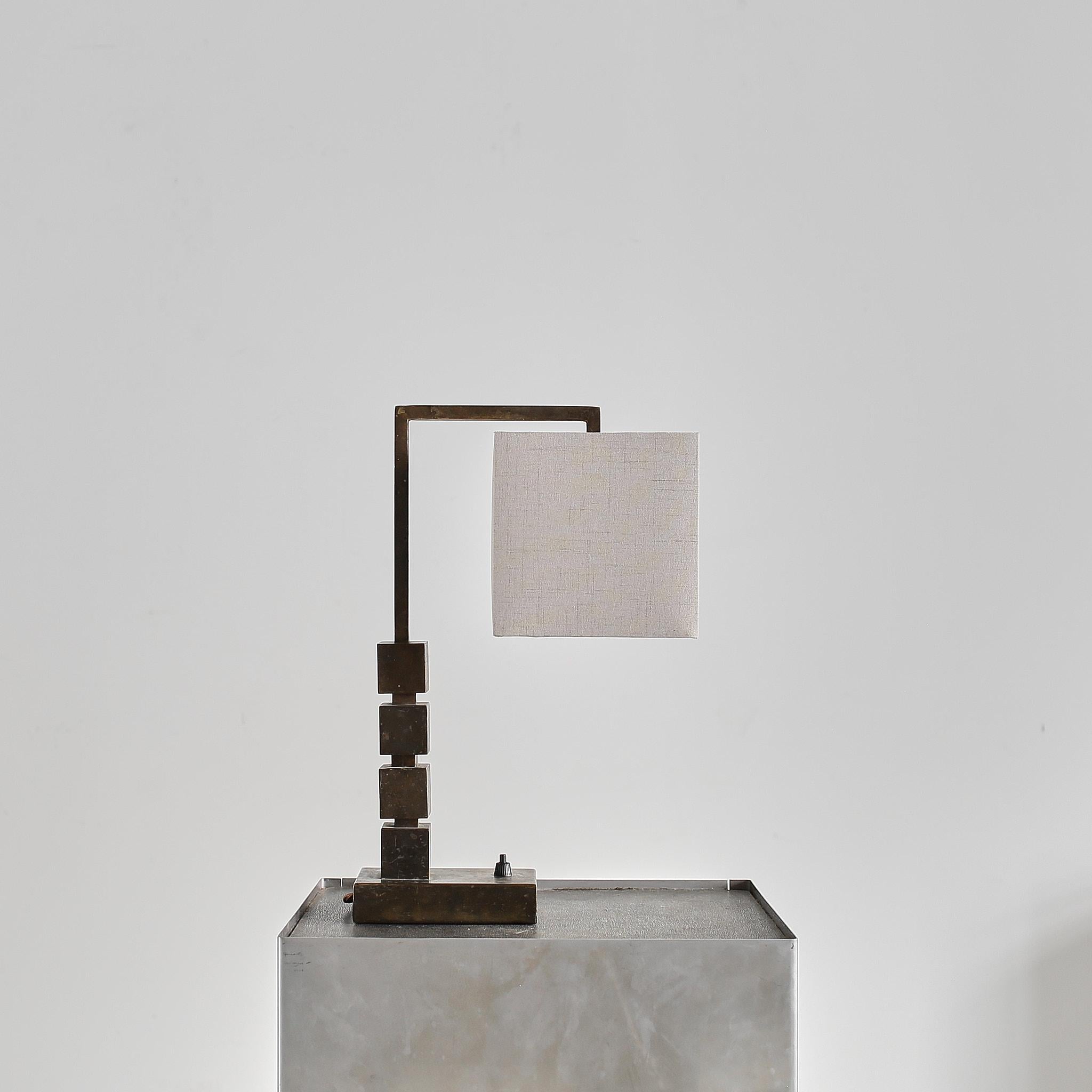 A unique C.1940s brass table lamp from Budapest.

Clearly inspired by the Czech cubist design movement earlier in the century.

Recently professionally re-wired/PAT tested.

Measurements include lampshade.

Rewiring for USA/Europe included in the