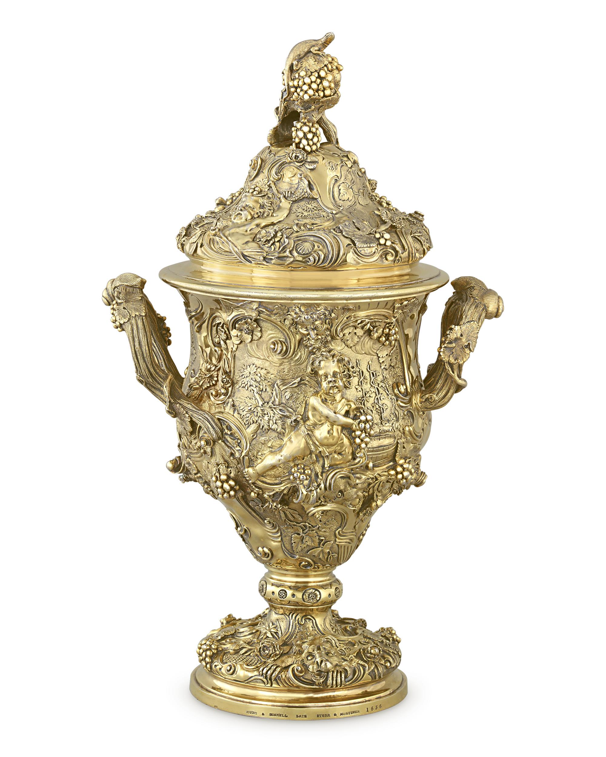 This exquisite 1897 two-handled presentation cup by esteemed silver firm Hunt & Roskell was modeled after a 1743 cup made by Paul Lamerie, the most famed London-based silversmith of the 18th century. The cup was presented to Sir David Salomons, the