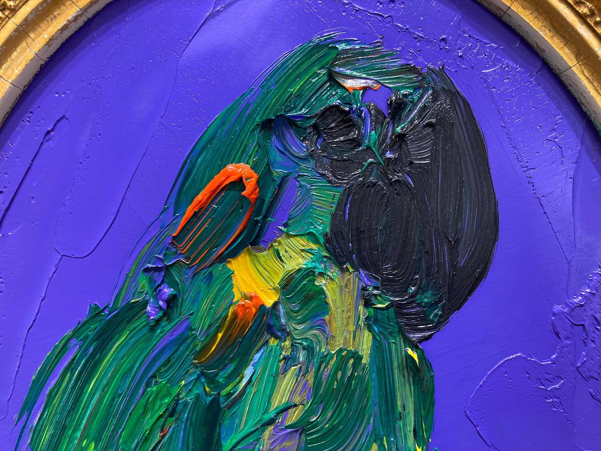 A wonderful composition of one of Slonem's most iconic subjects of a single Parrot on a dark blue/ purple background. The thick use of paint is greatly recognizable as he slathers on layer after layer of oil paint. He then draws in the green bird