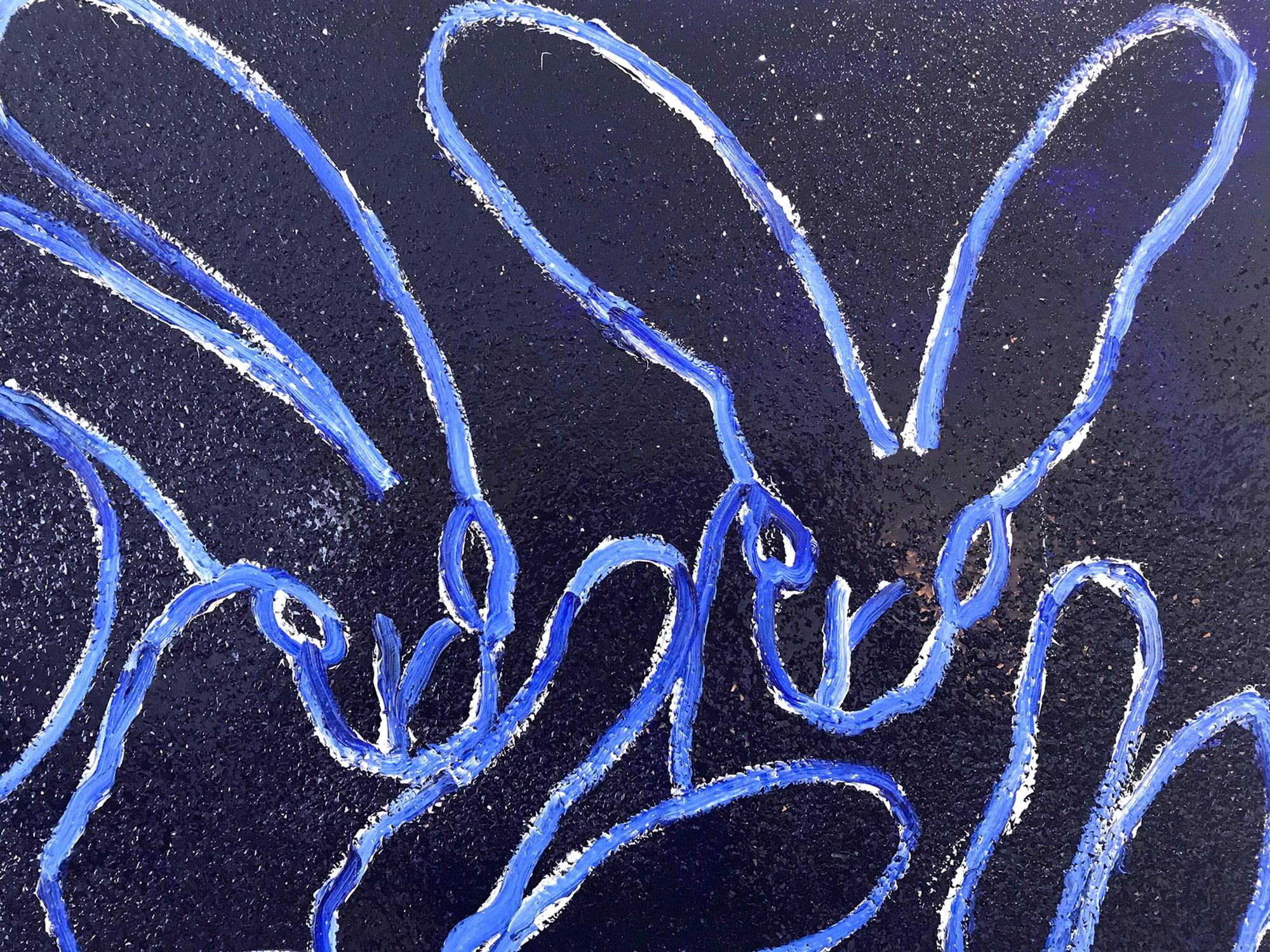 A wonderful composition of one of Slonem's most iconic subjects, Bunnies. This piece depicts gestural figures of white bunnies on an Ultramarine blue background with thick use of paint and diamond dust. Inspired by nature and a genuine love for