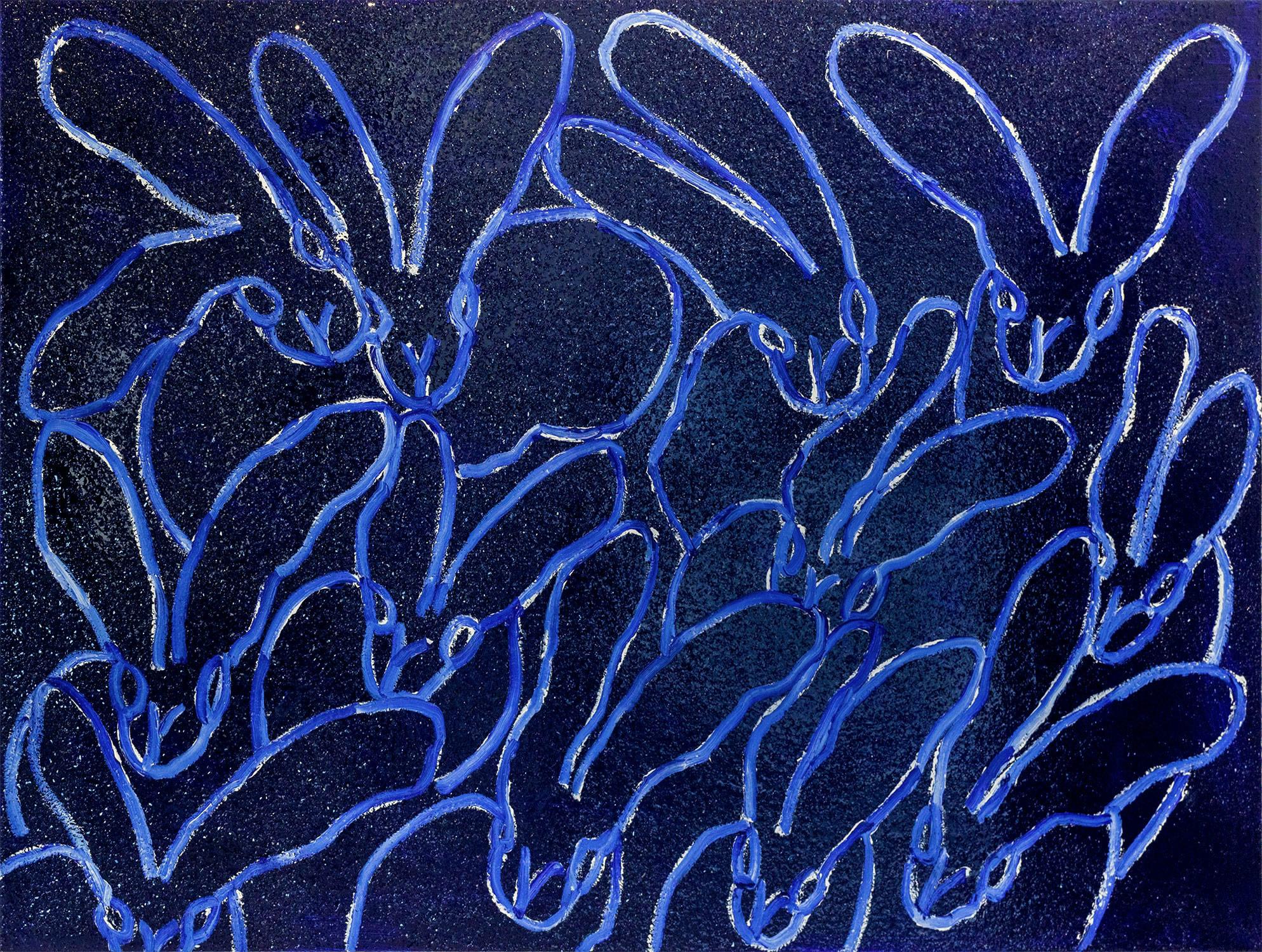 A wonderful composition of one of Slonem's most iconic subjects, Bunnies. This piece depicts gestural figures of white bunnies on an Ultramarine blue background with thick use of paint and diamond dust. Inspired by nature and a genuine love for