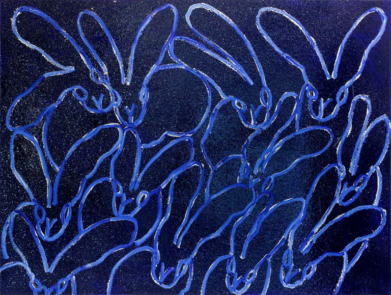 A wonderful composition of one of Slonem's most iconic subjects, Bunnies. This piece depicts gestural figures of white bunnies on an Ultramarine blue background with thick use of paint and diamond dust. On gallery wrap canvas. Inspired by nature and