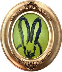 "Chartreus" Oval Black Bunny on Light Green Background with Gold Toned Frame