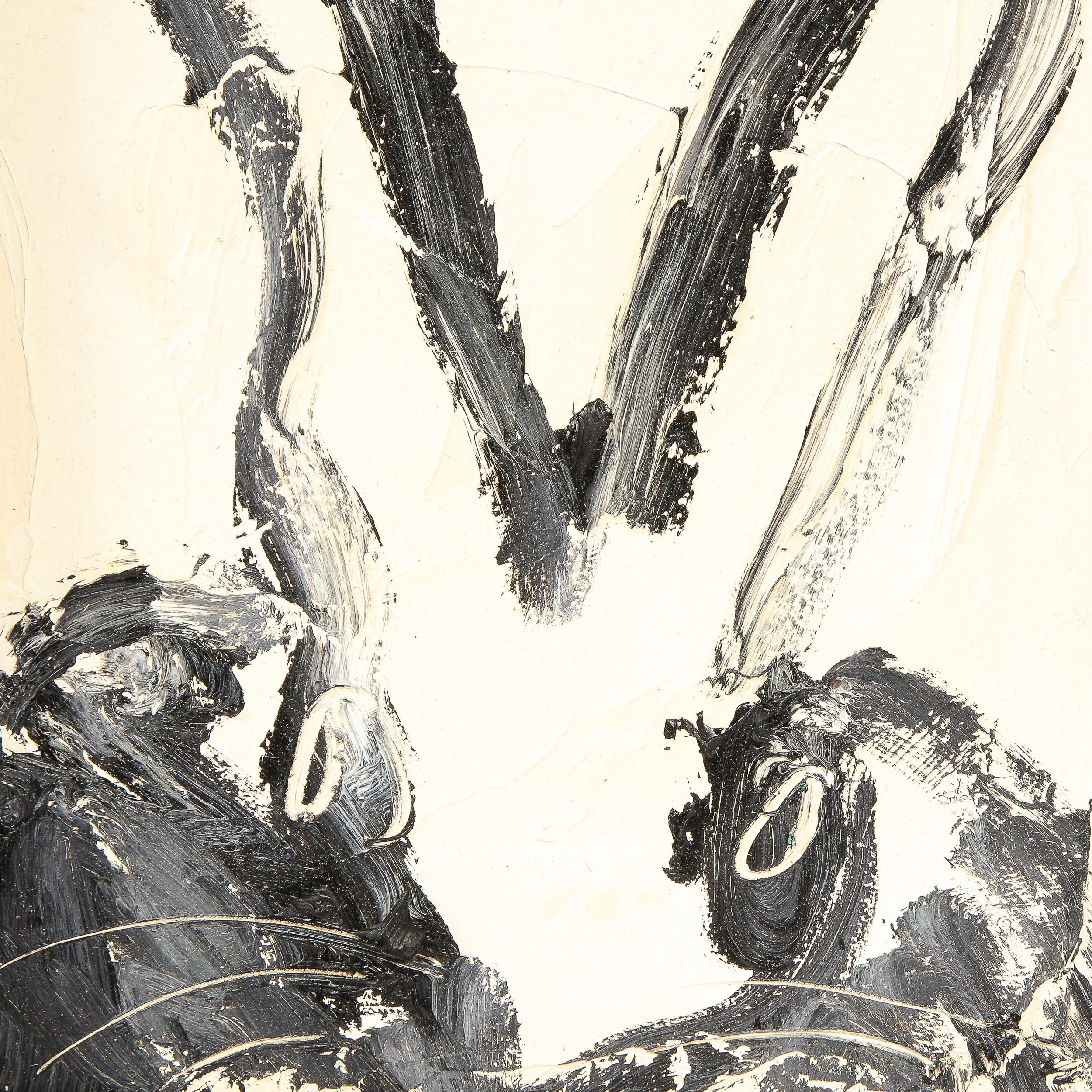 This whimsical and sophisticated painting was realized by the esteemed contemporary painter, Hunt Slonem in 2015. It presents a stylized rabbit in profile, rendered with loose and expressive brush strokes in black and white paint. Bold, graphic and